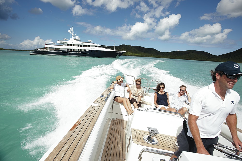 Side profile of UNBRIDLED on the water