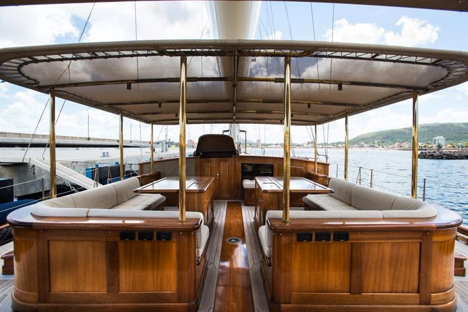 Interior detail showing classic lamps and bronze faucets on the DONA FRANCISCA.