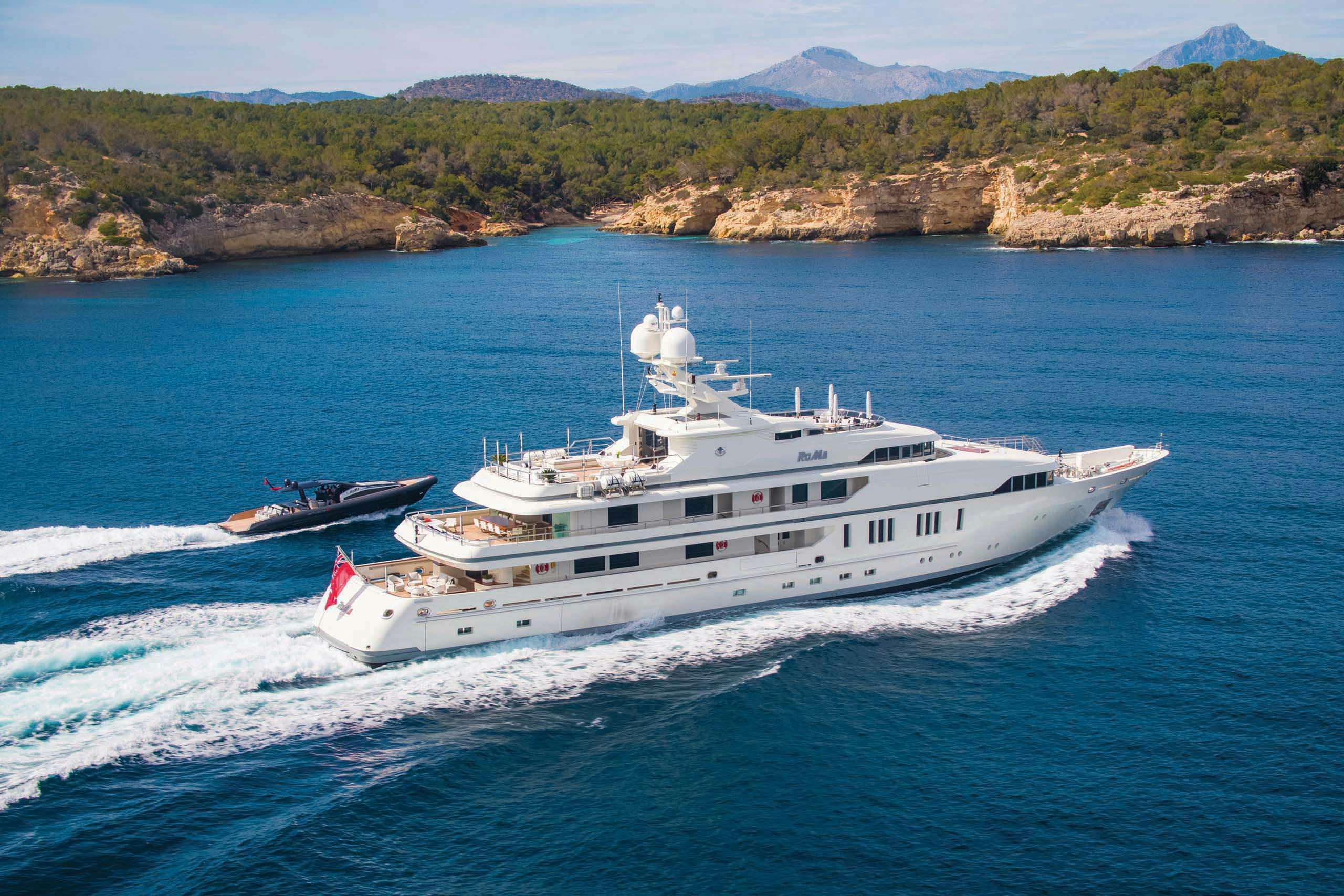 200ft charter yacht cruising the mediterranean in summer
