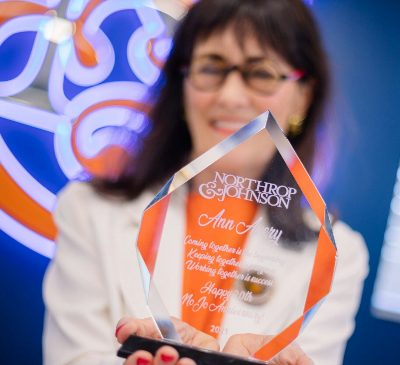 Annie Avery holding award