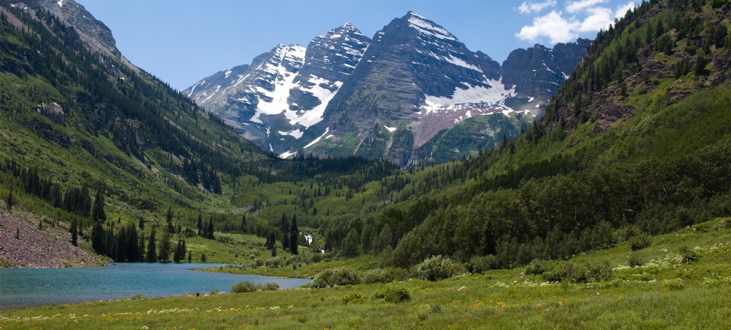 A tranquil view of Aspen's natural and green landscape, a serene escape during the bustling FOOD & WINE Classic in Aspen.