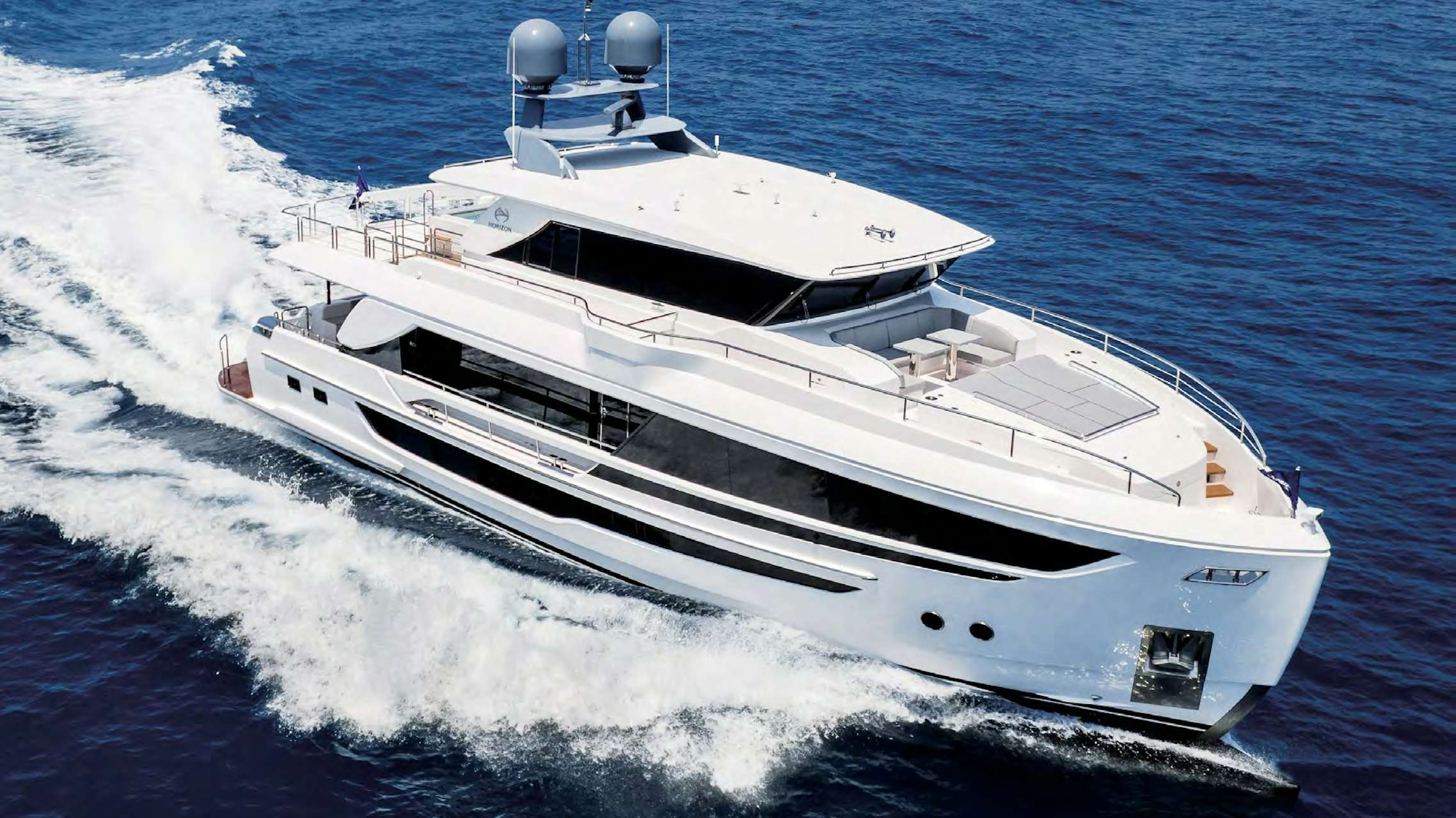 The Horizon FD 80 yacht cruising at speed on the open water, showcasing its sleek design.