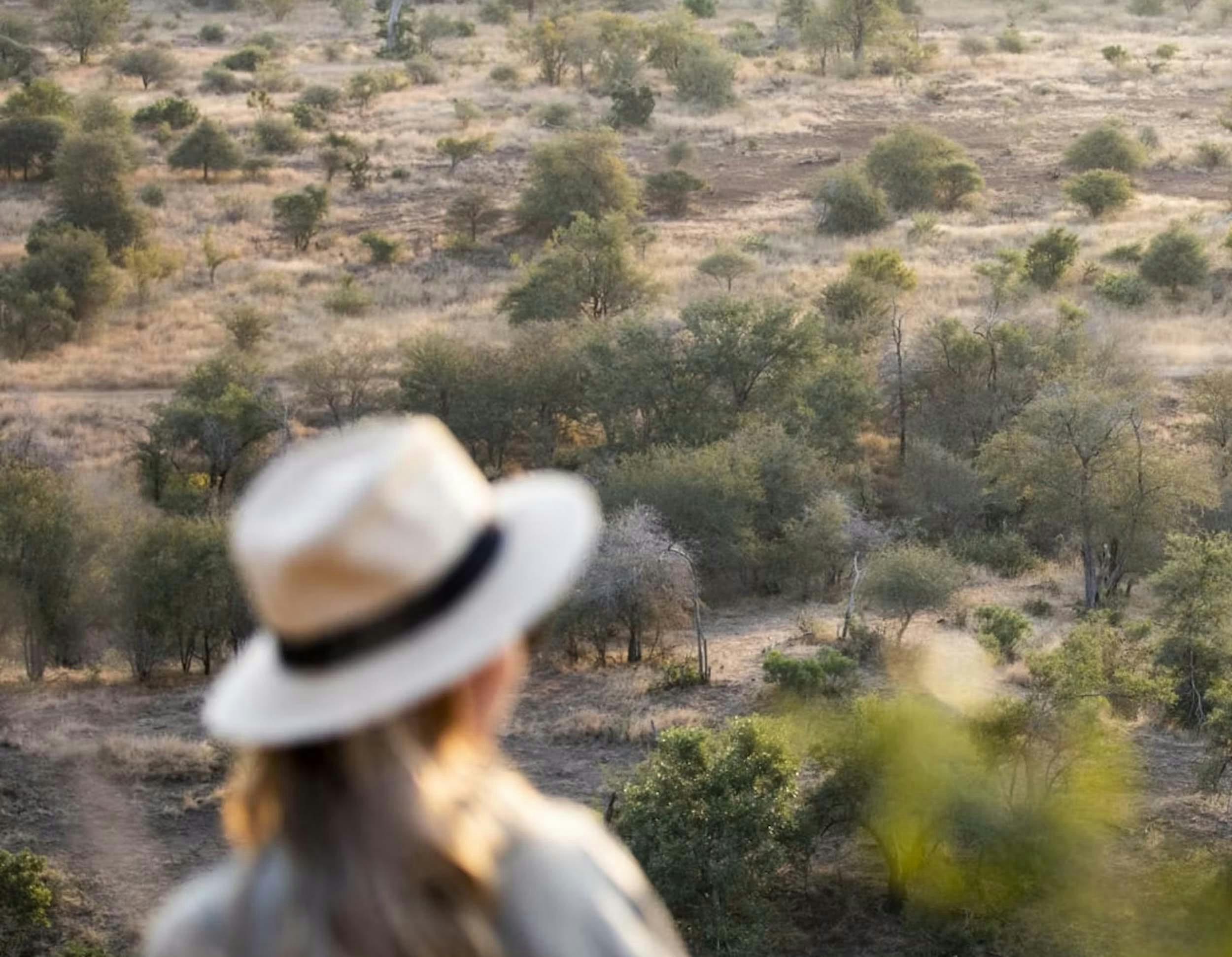 Exclusive Resorts safari image of a woman on a safari
