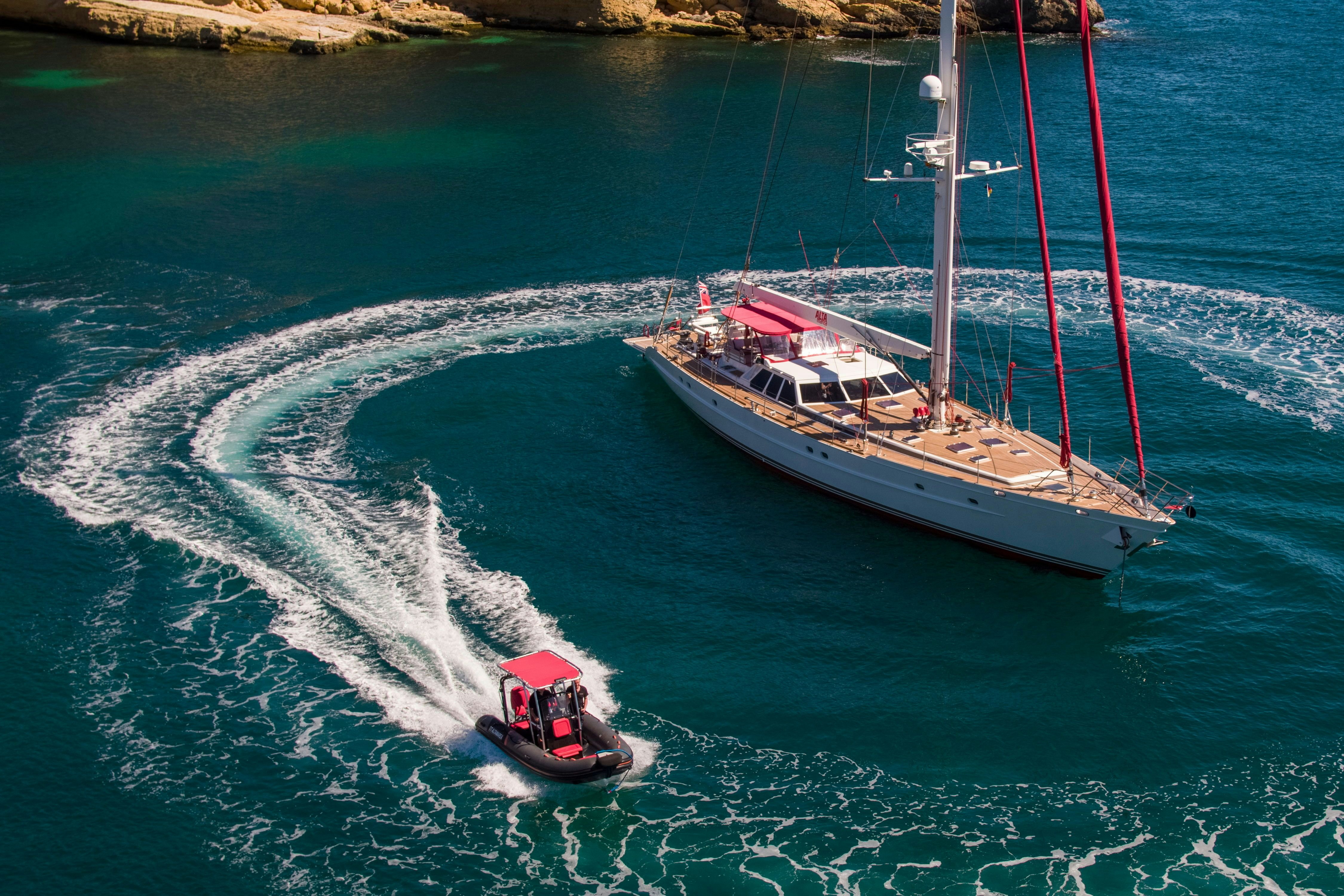 ALTA MARE sailing yacht at anchor with tender