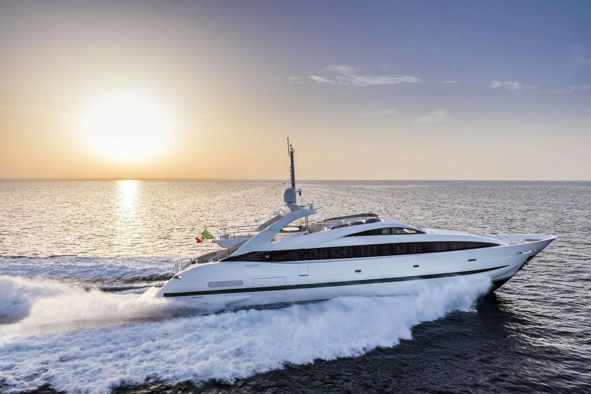 Motor Yacht Clorinda speeding before sunset | Yacht for sale | N&J