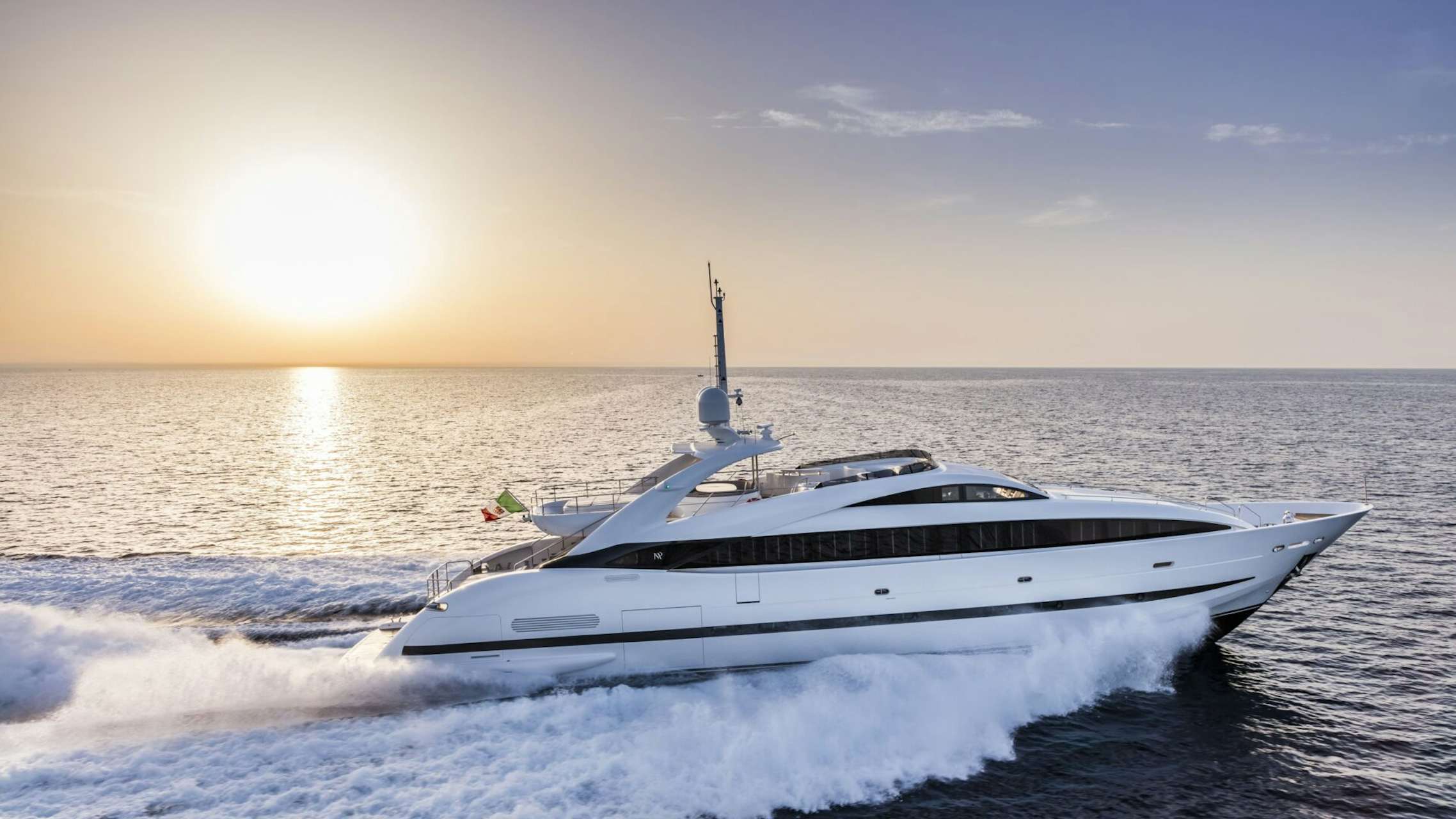 Motor Yacht Clorinda speeding before sunset | Yacht for sale | N&J