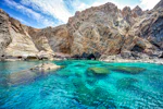 Turquoise transparent sea waters, in Tinos island, Greece