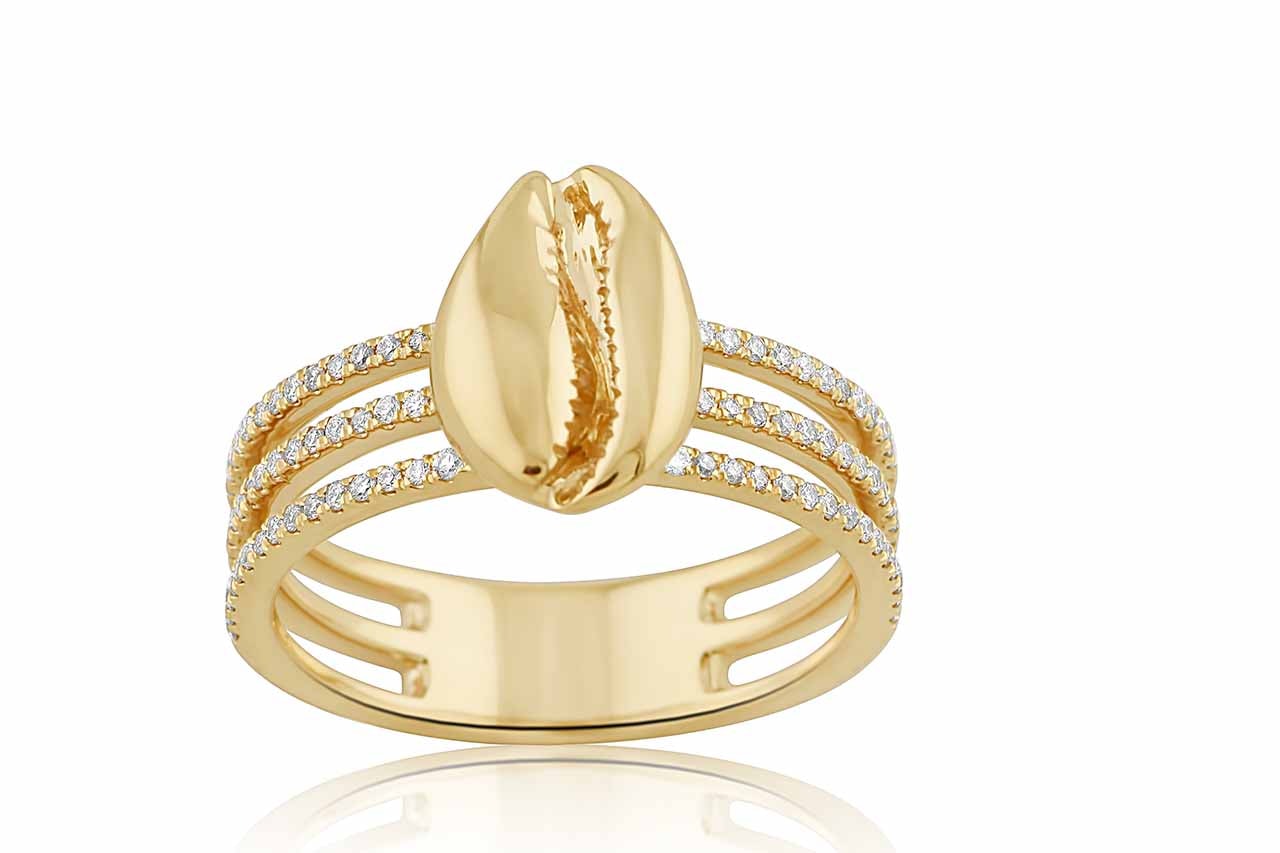 A three-tiered golden ring with pave diamonds and a shell