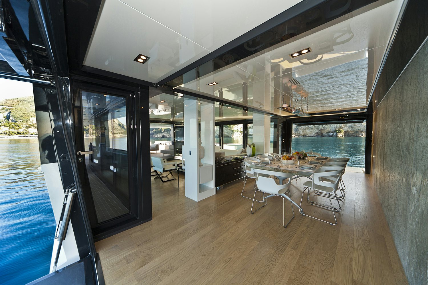 Arcadia 115 yacht indoor dining room with balconies Arcadia 115 yacht indoor dining room with balconies