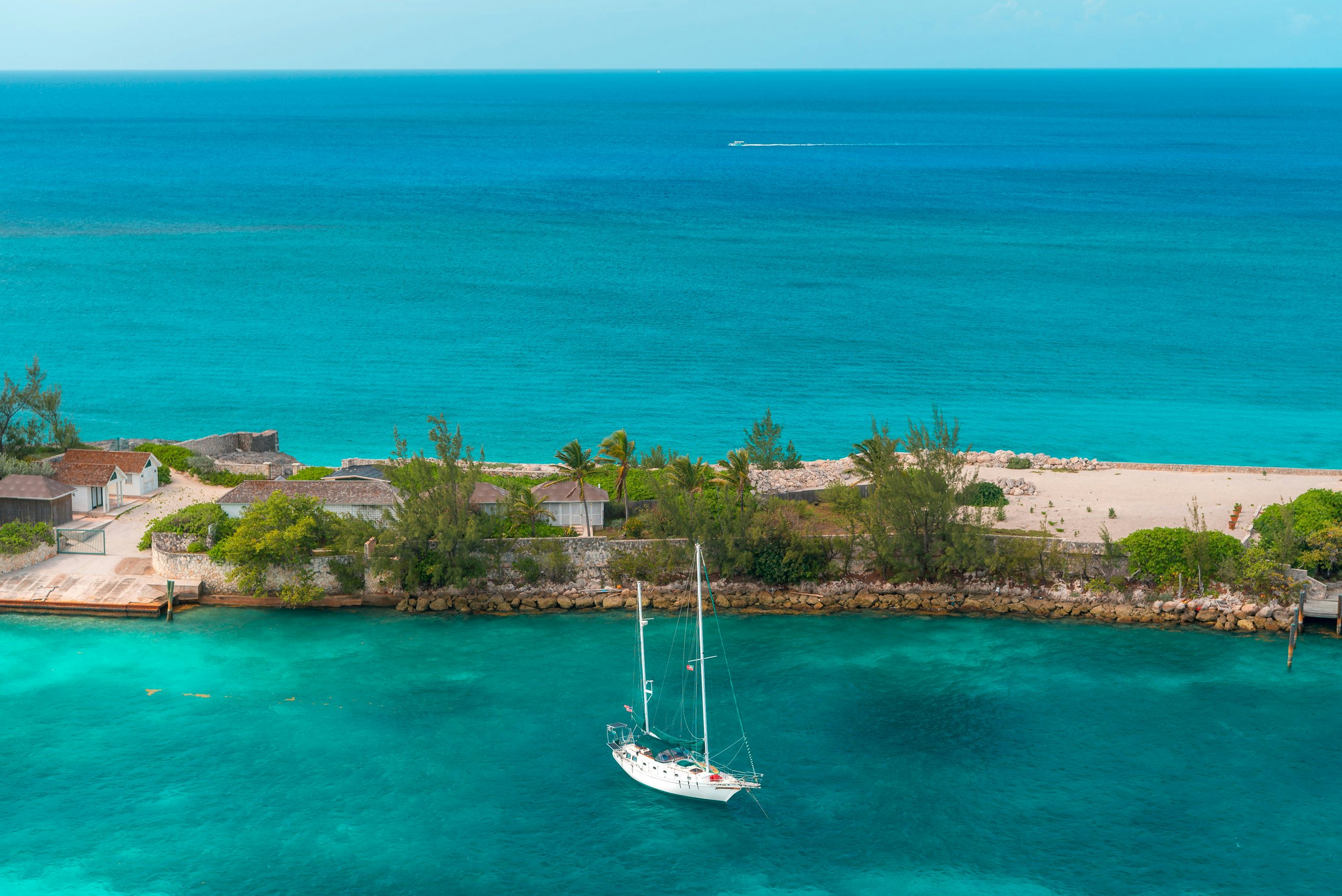 Amazing,Nassau,City,,The,Bahamas Amazing Nassau City, The Bahamas with a sailboat in picture against turquoise waters