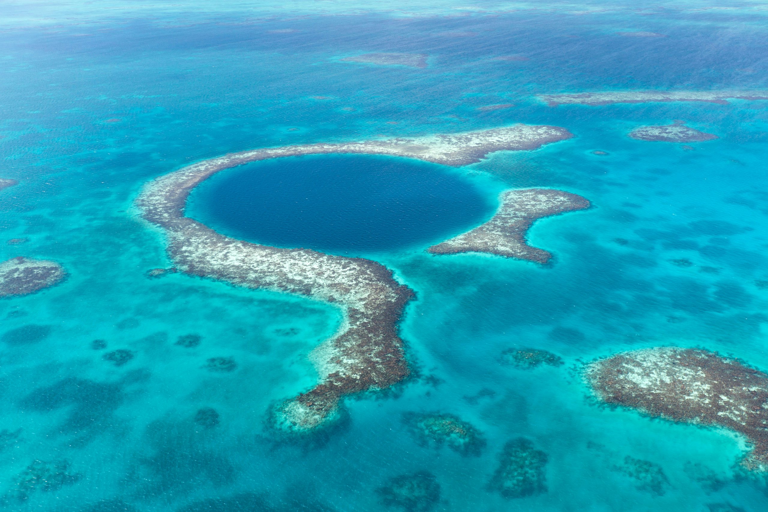 Belize Yacht Charter - Belize_Blue Hole Belize Yacht Charter - Aerial view of the blue hole in Belize