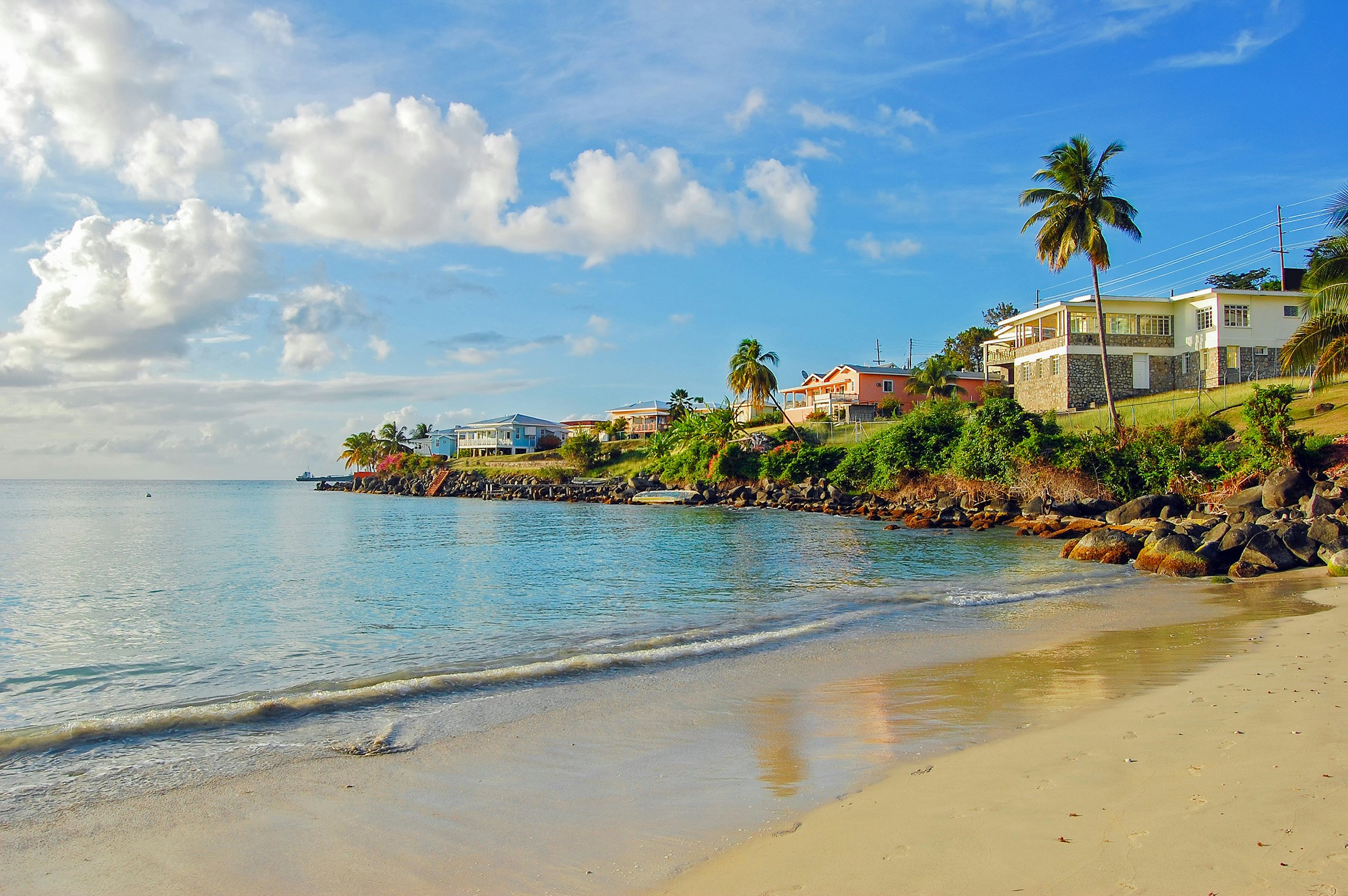 Windward Islands Grenada Luxury Yacht Charter - Caribbean_Windward_Grenada_Homes on Beach Windward Islands Grenada Luxury Yacht Charter - Caribbean_Windward_Grenada_Homes on Beach_clear day in the caribbean, classic caribbean picture with clear waters