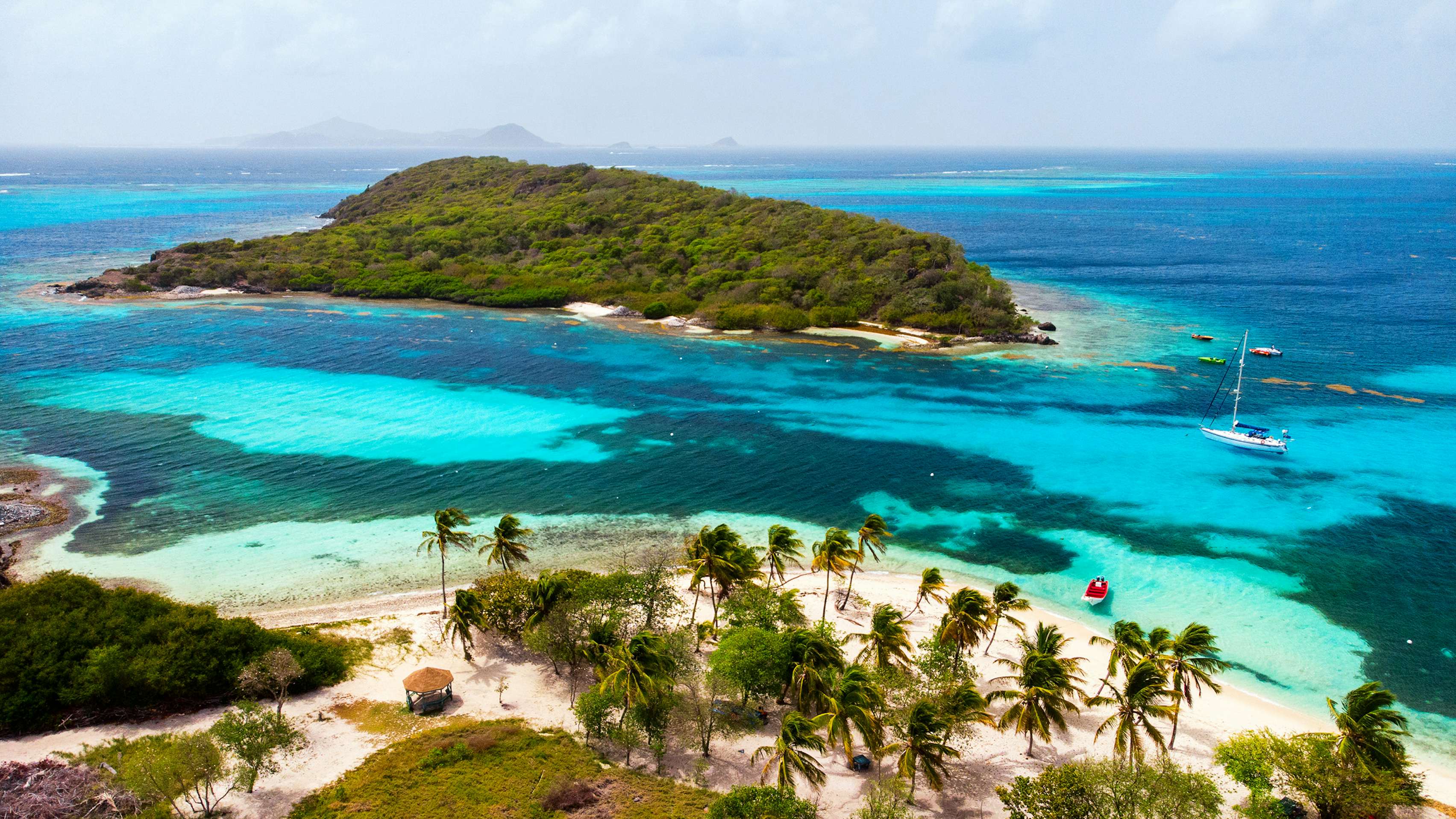 Trinidad & Tobago Yacht Charter - Tobago cays, Caribbean, aerial view of lush beaches and turquoise waters