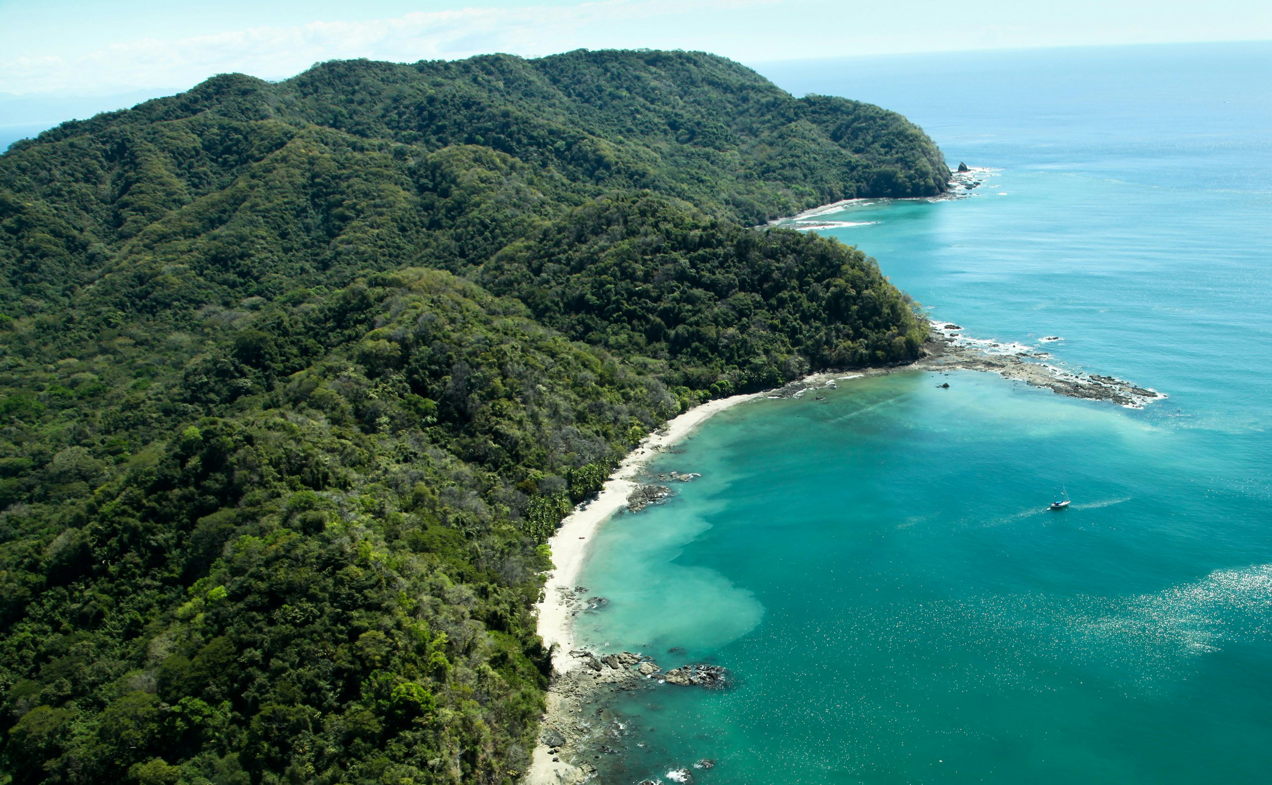 Costa Rica Crewed Yacht Charter -Central America_Costa Rica_Ballena Bay Costa Rica Crewed Yacht Charter -Ballena Bay, Costa Rica, Central America , aerial view of lush mountain landscapes and blue water