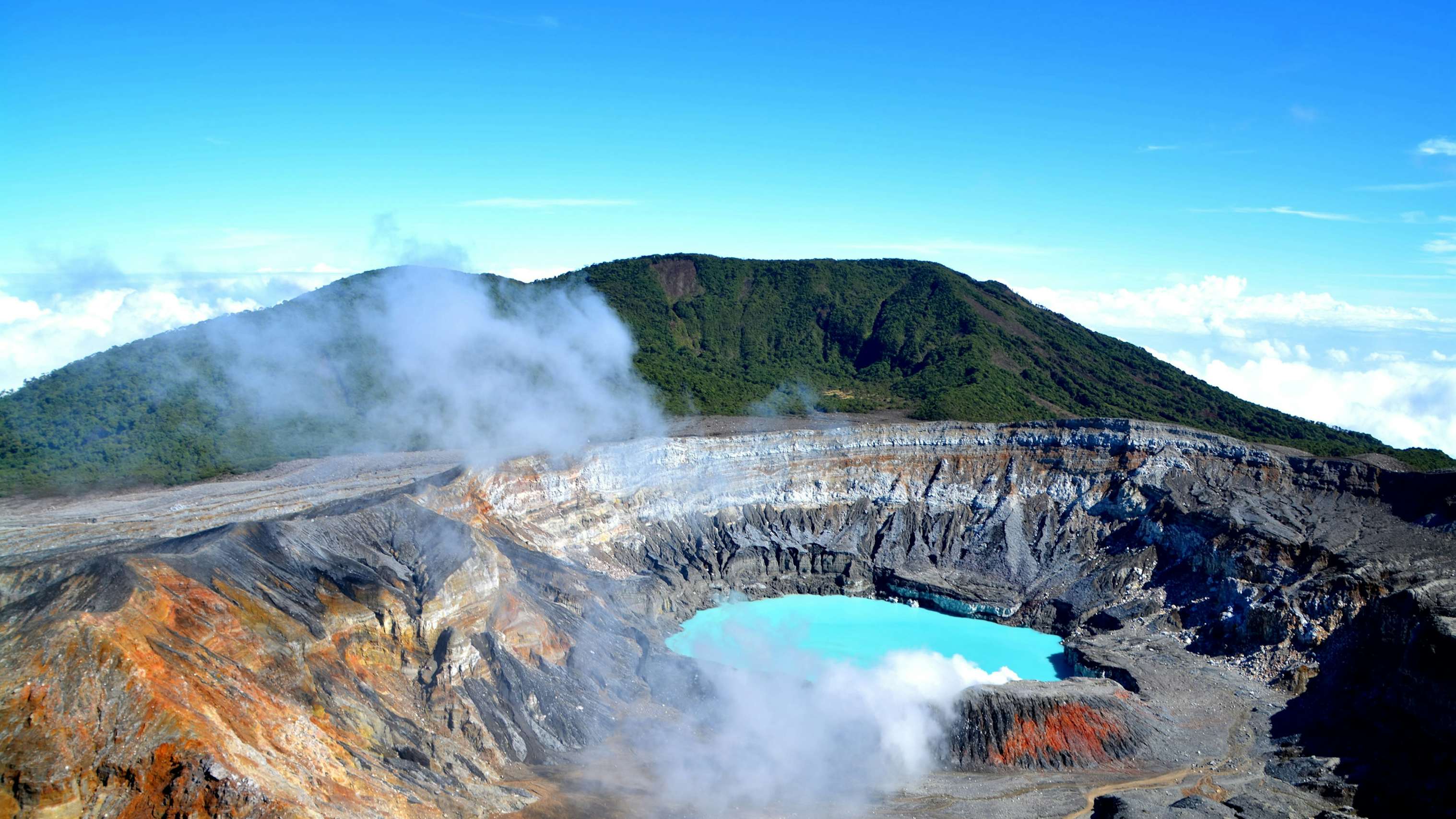 Costa Rica Yacht Charter - Poas Volcano, Costa Rica, cetral america with hot spring and steam bright blue sky