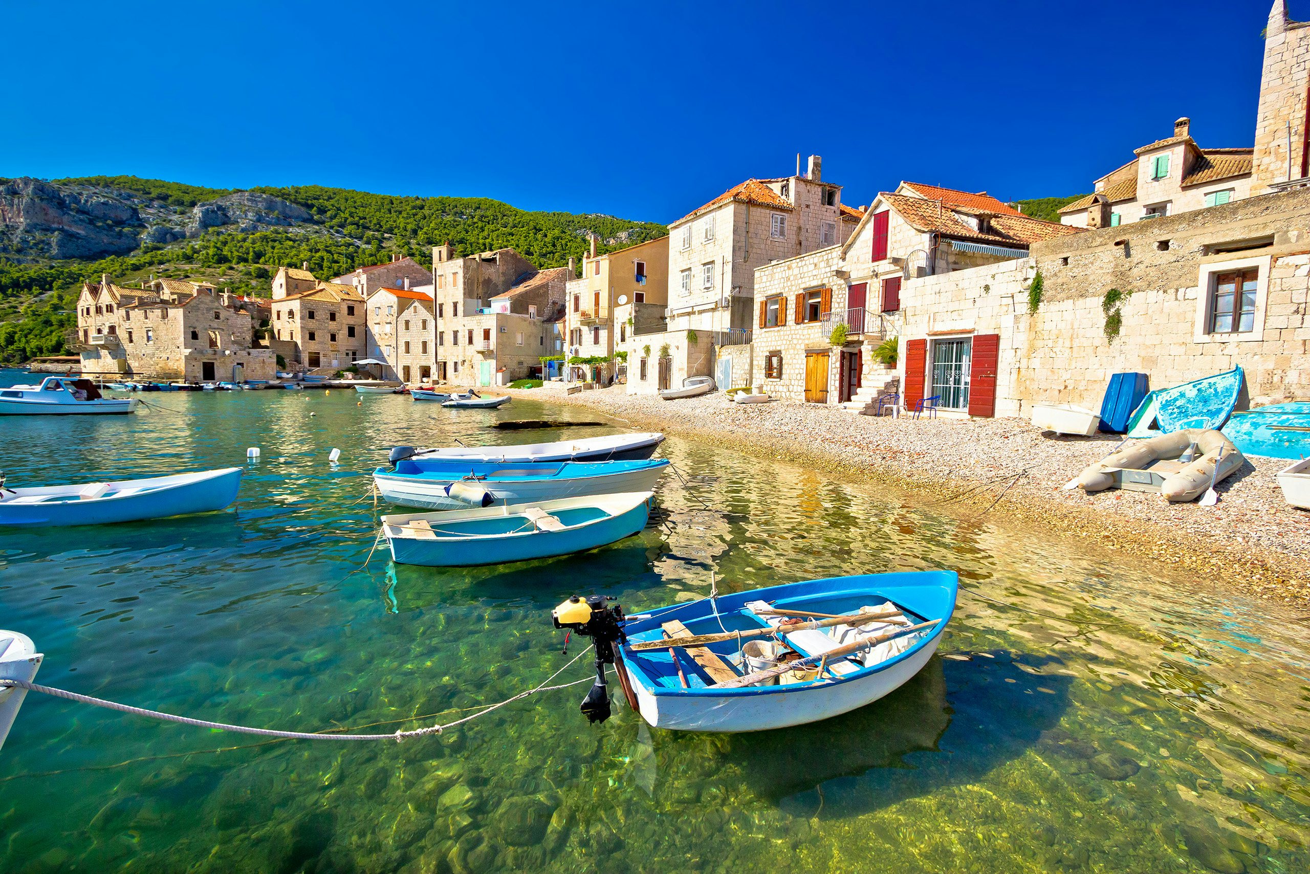 Serene Vis harbor scene, perfect for a secluded yacht charter experience in Croatia
