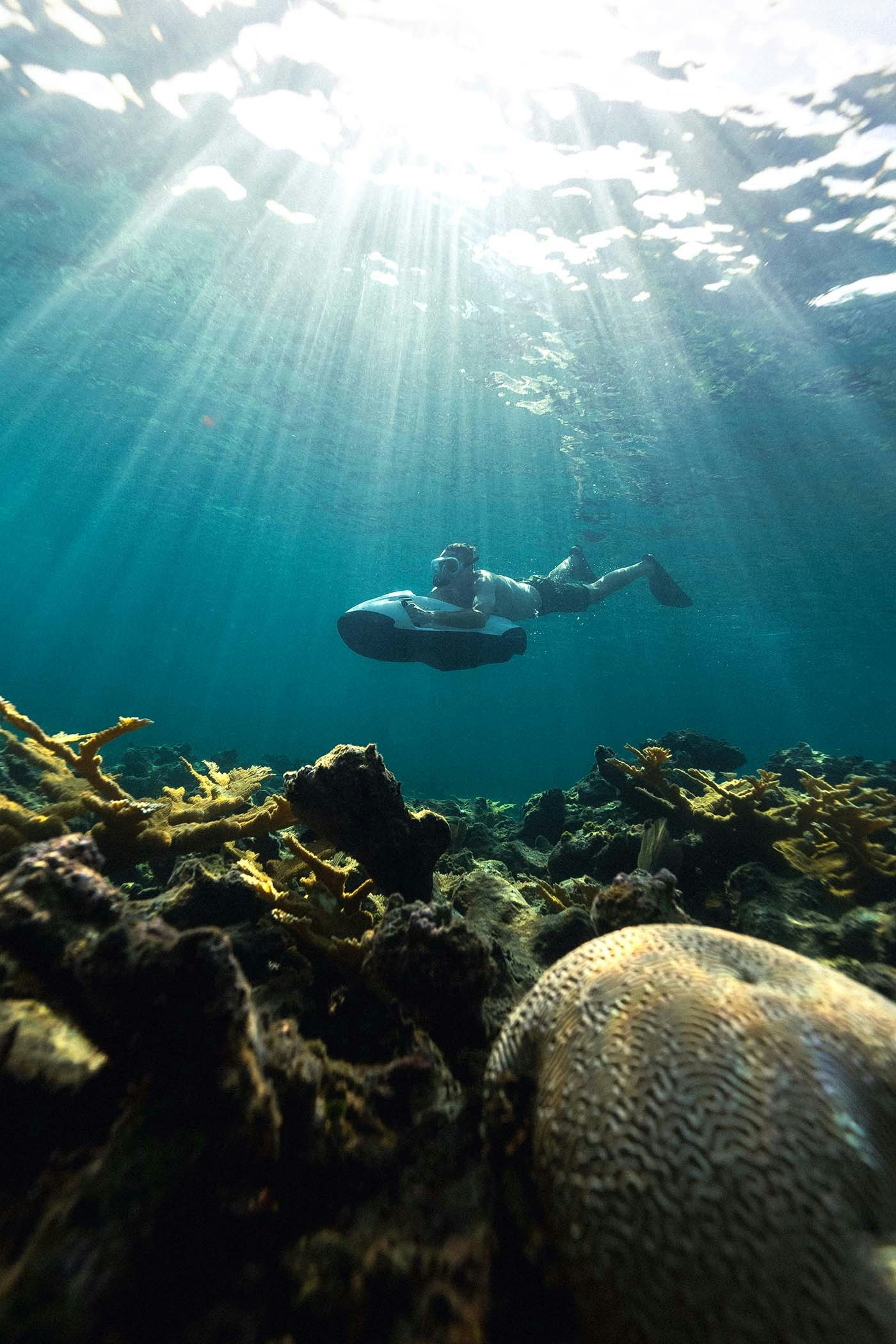 Person using seabob underwater