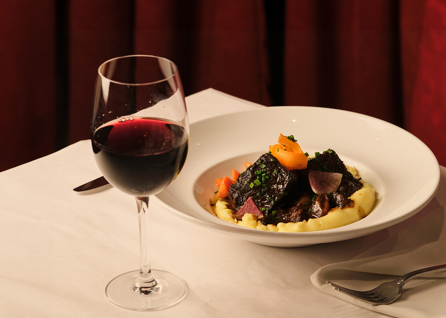 Pistache west palm beach meal of beef bourguignon and red wine