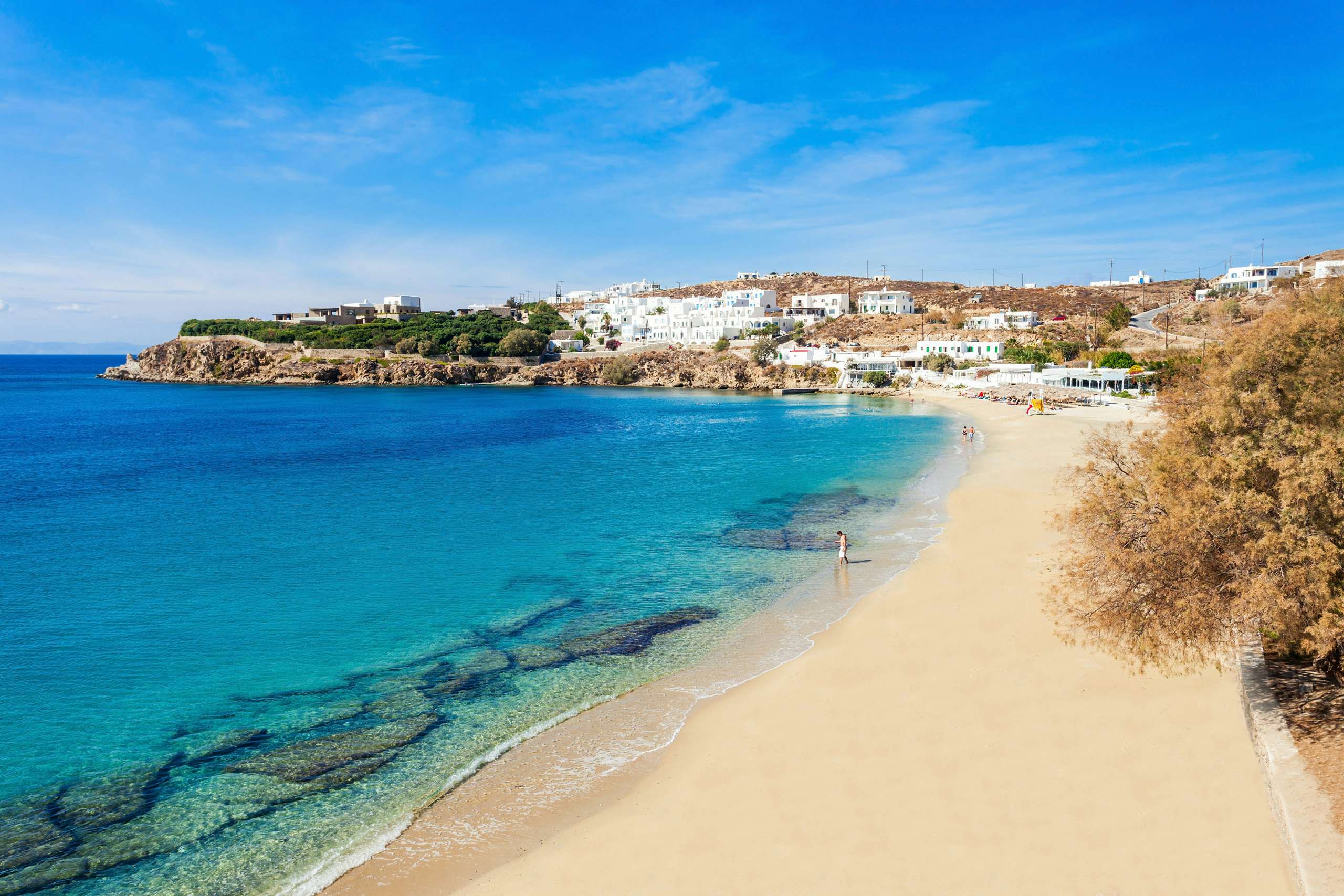 The serene shores of the Dodecanese islands with clear waters and sandy beaches, inviting a peaceful yacht anchorage.