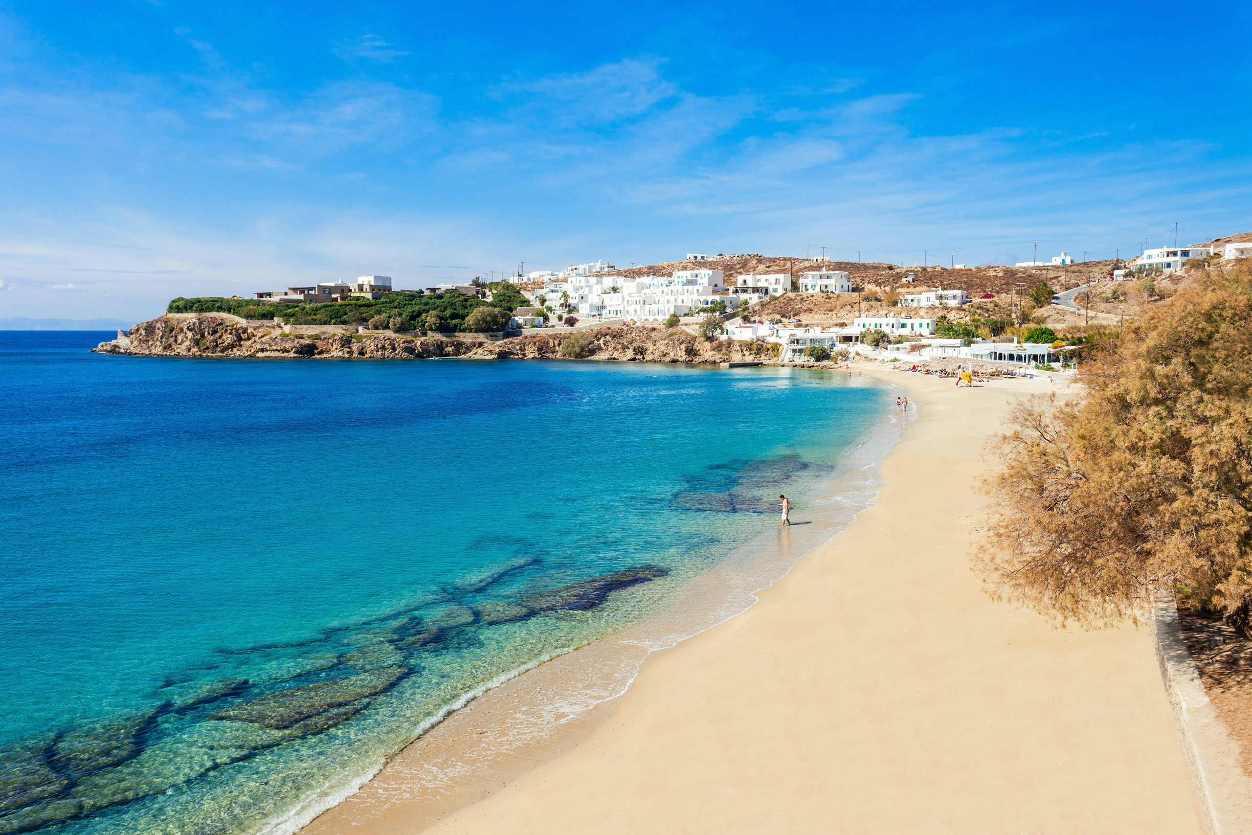 Dodecanese Serenity - Pristine Beaches Await on Your Yacht Charter The serene shores of the Dodecanese islands with clear waters and sandy beaches, inviting a peaceful yacht anchorage.