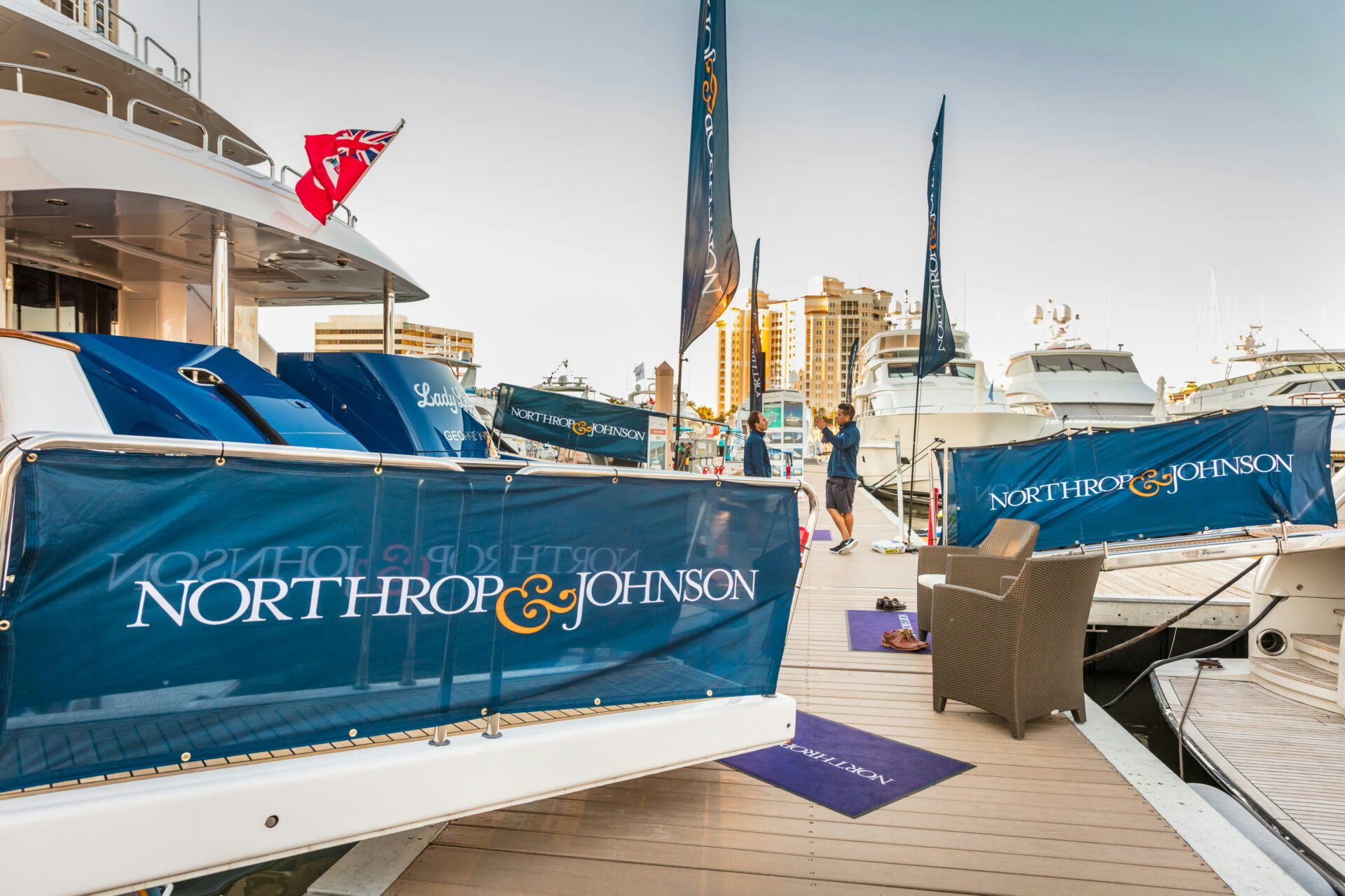 A close-up view of the branded Northrop & Johnson gangway on a luxury yacht available for charter during the Palm Beach International Boat Show.