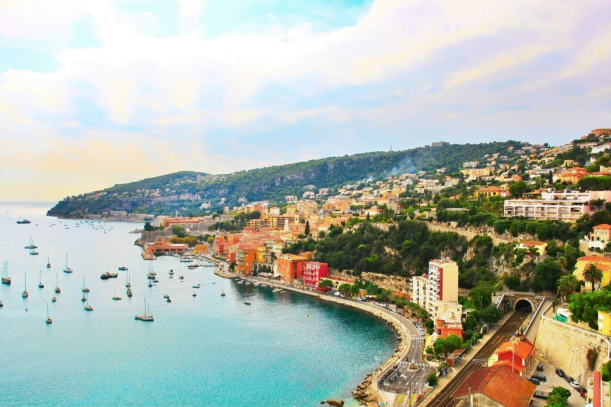 Cap Ferrat - Discover Yachting Serenity on the French Riviera Aerial view of the stunning Cap Ferrat peninsula, with its sheltered bays and luxury villas, a yachting paradise.