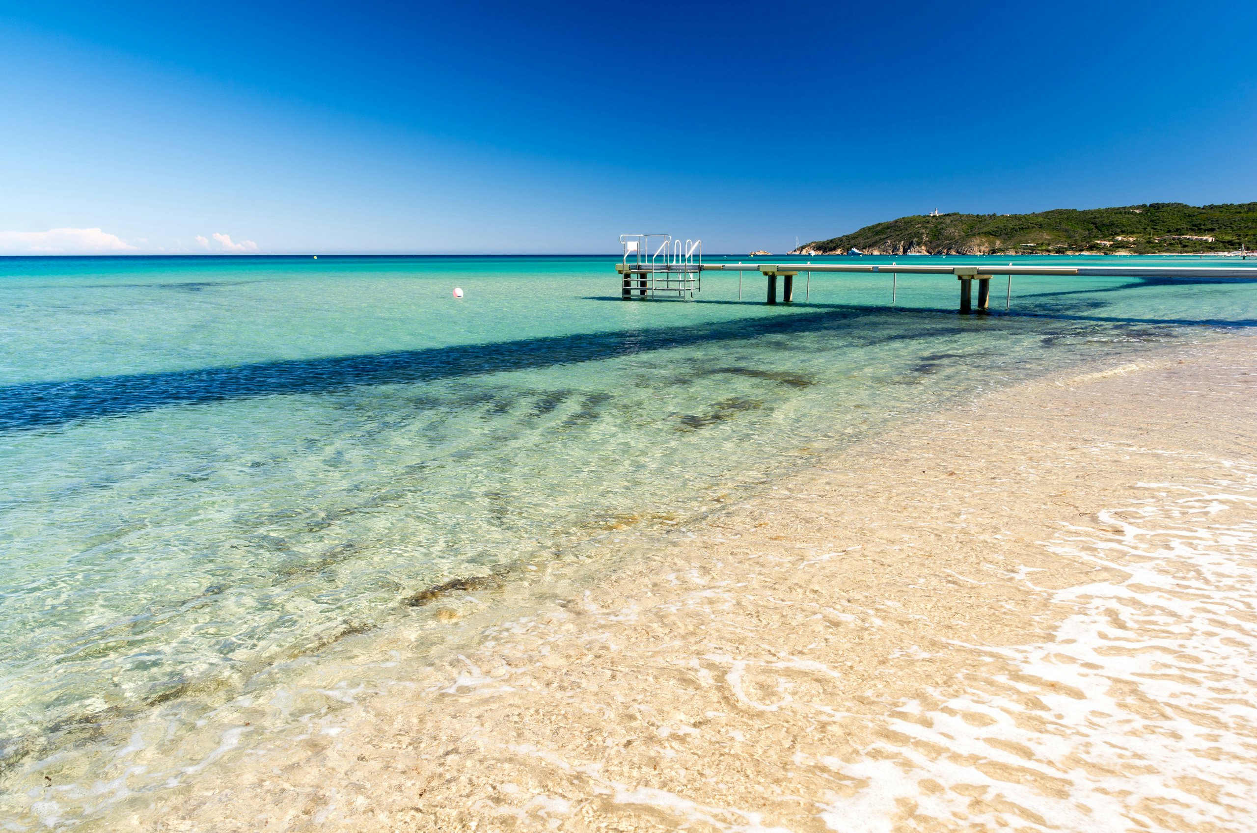 Pampelonne Beach Luxury - French Riviera's Finest | Yacht Charter Clear, shallow waters and fine sandy beach of Pampelonne, an idyllic stop for yacht charters on the French Riviera.