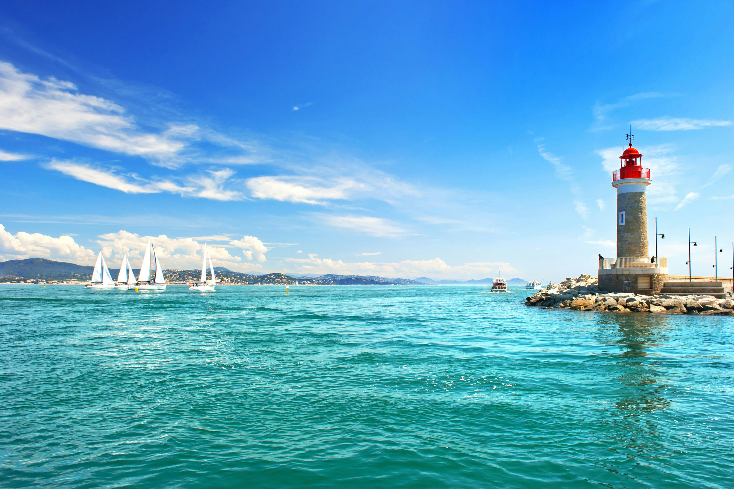 St. Tropez Sailing Excursion | Premier French Riviera Yacht Charter Crystal-clear turquoise waters of St. Tropez, a favorite anchorage for yacht charters on the French Riviera.