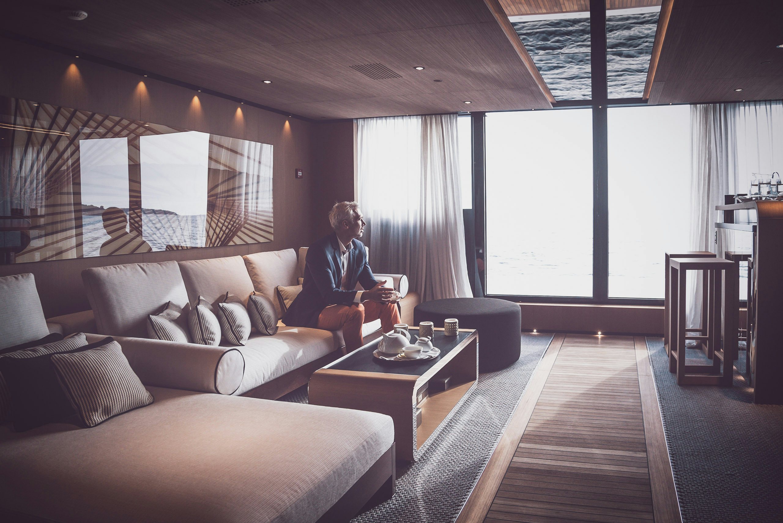 How_to_buy_a_yacht_Step_4 Yacht owner having coffee on board superyacht