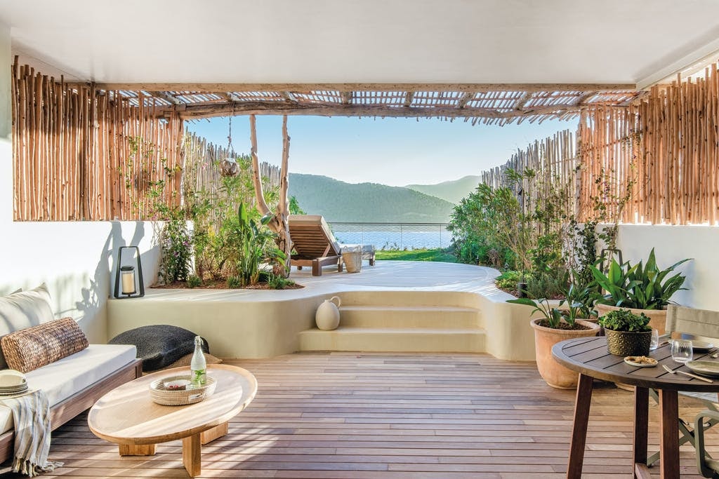 Six Senses Ibiza building terrace with private sundeck and view of the bay