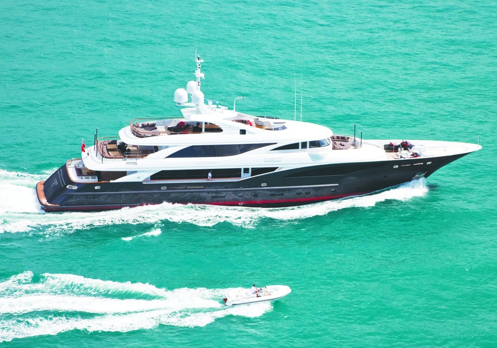 Charter Yacht LIBERTY cruising with her RIB tender