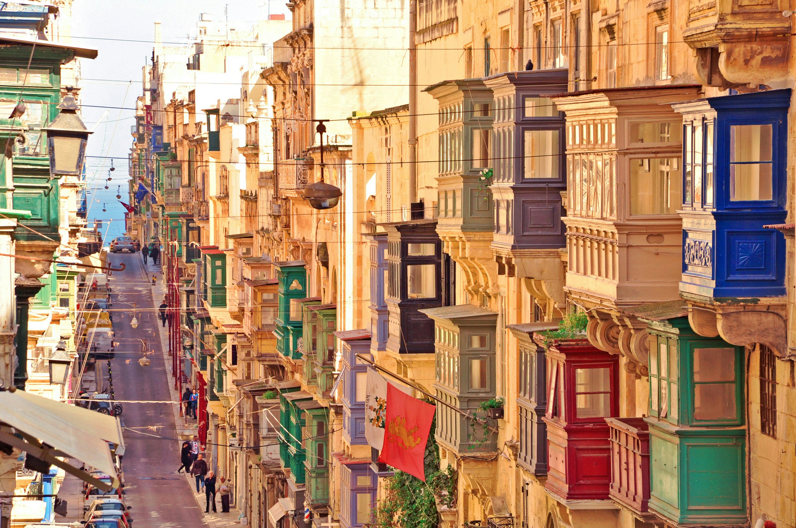 Charming streets of Valletta with traditional Maltese balconies, inviting exploration on a Malta yacht charter.