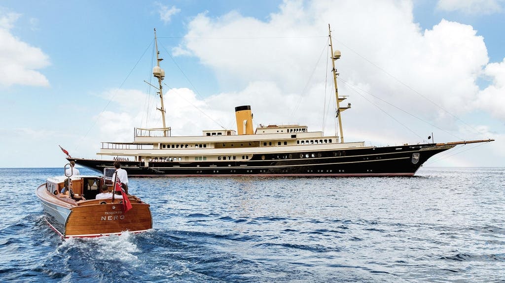 NERO yacht charter at anchor with classic tender