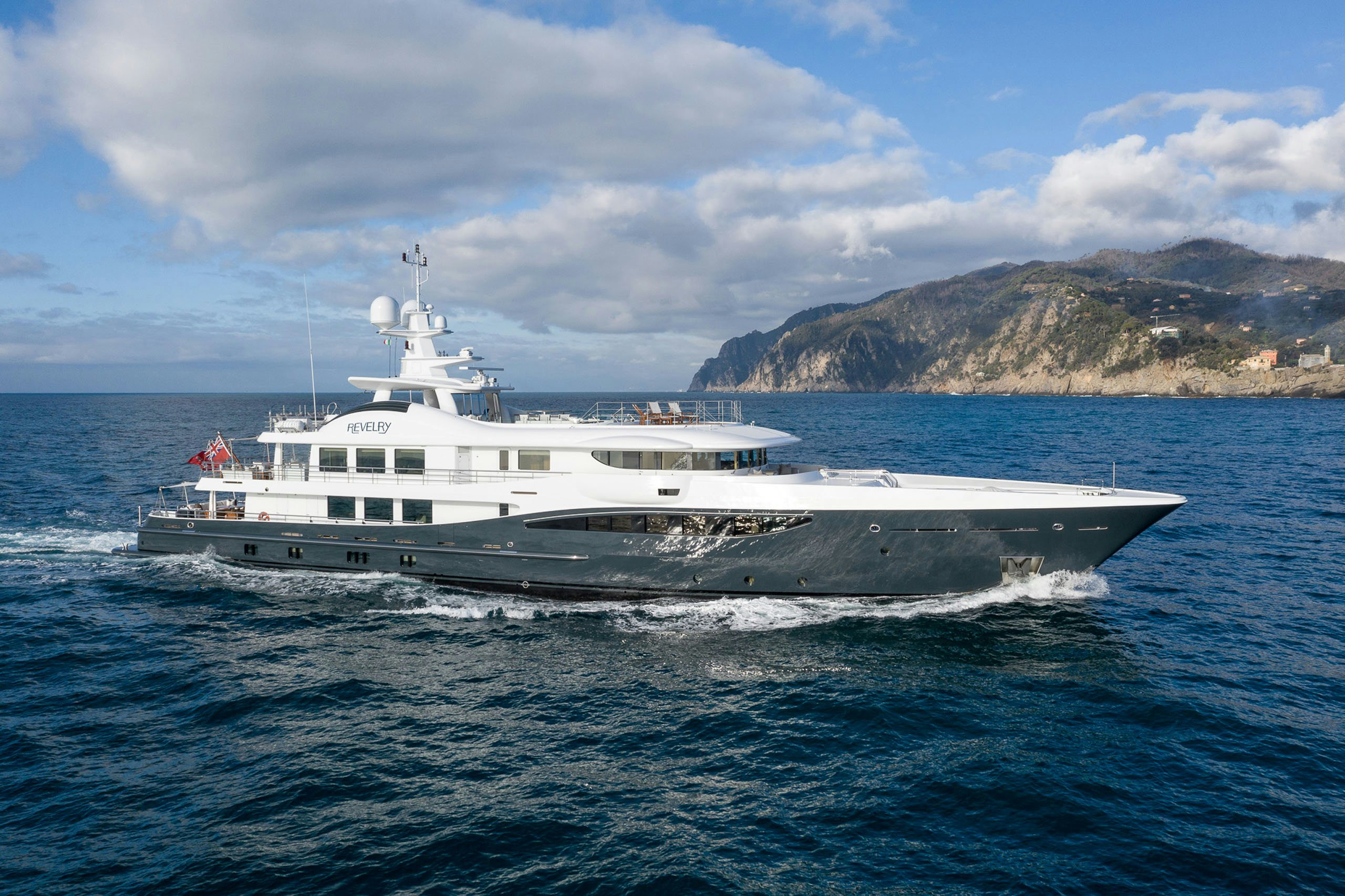 Charter yacht Revelry cruising along the coast