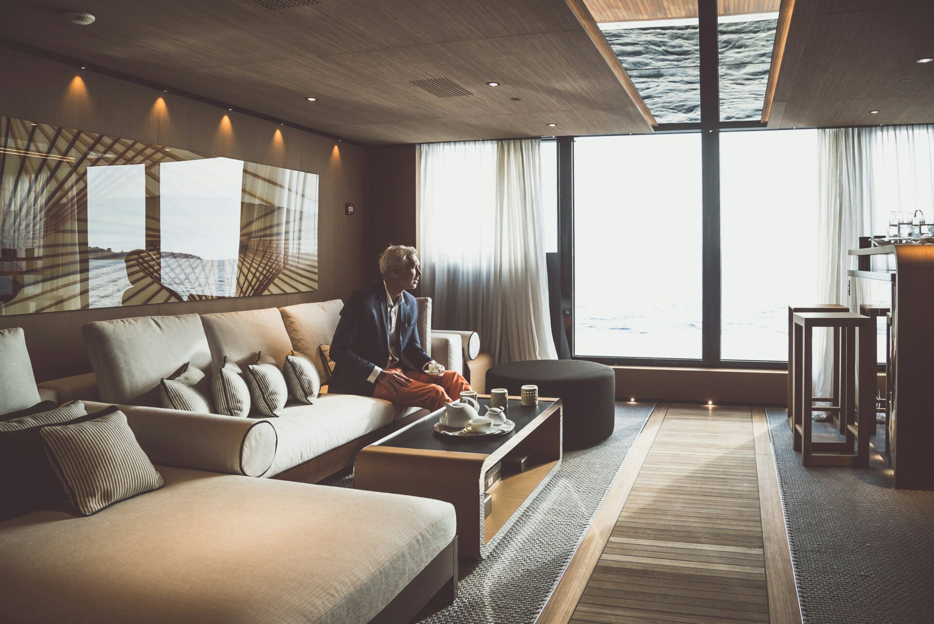 Yacht owner enjoying refreshments on board