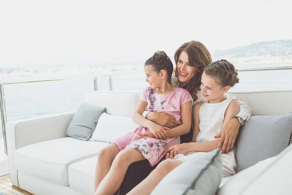 Mother and daughters aboard SUERTE