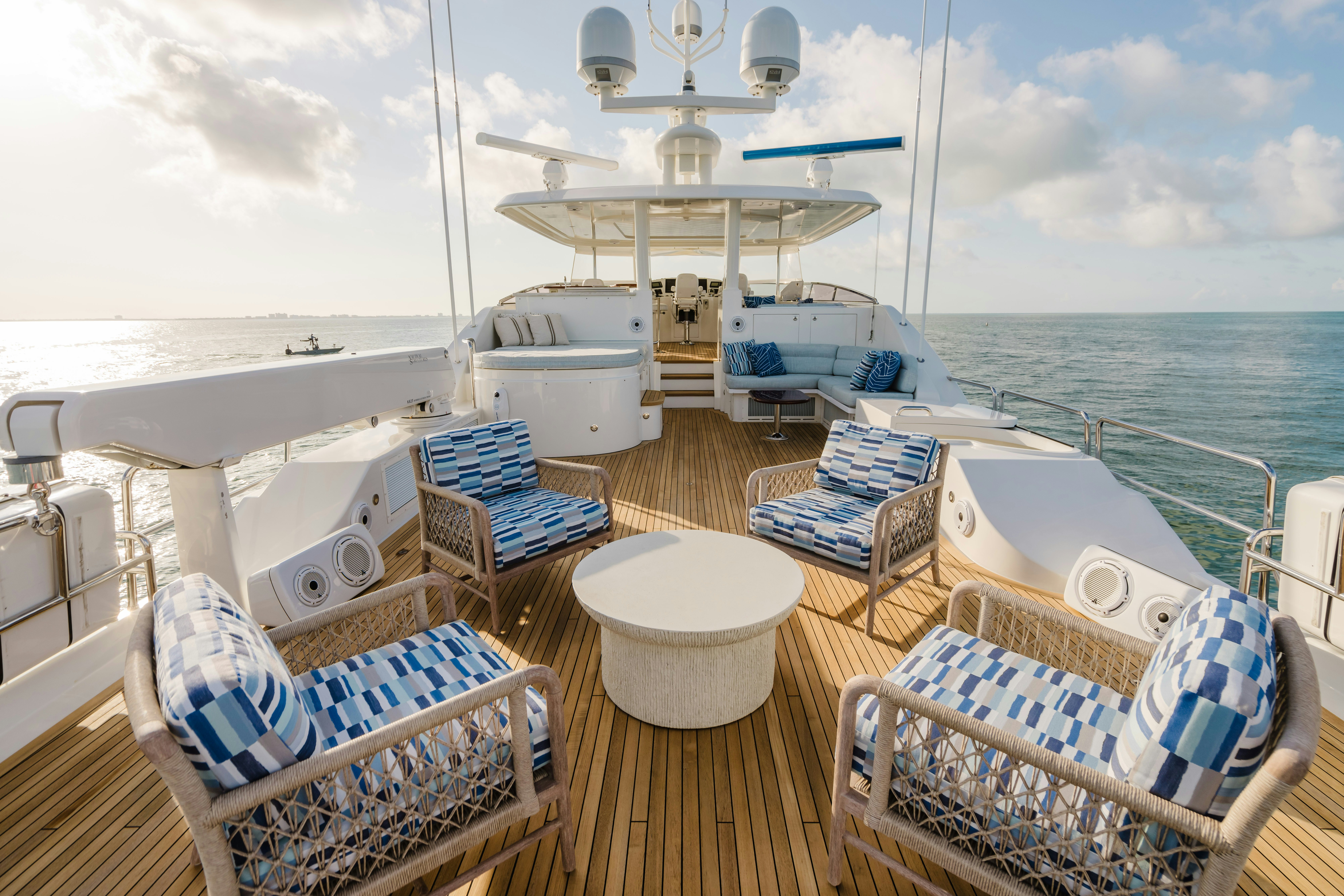 seaquinn top deck with loungers showing the horizon in the distance