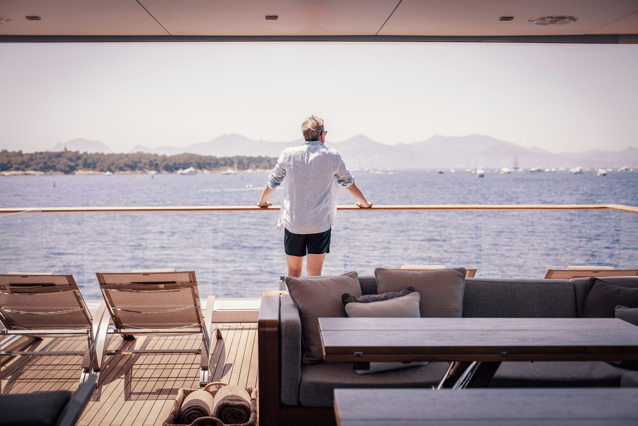 Yacht owner looking at panorama from onboard his yacht | Yacht Brokerage | N&J