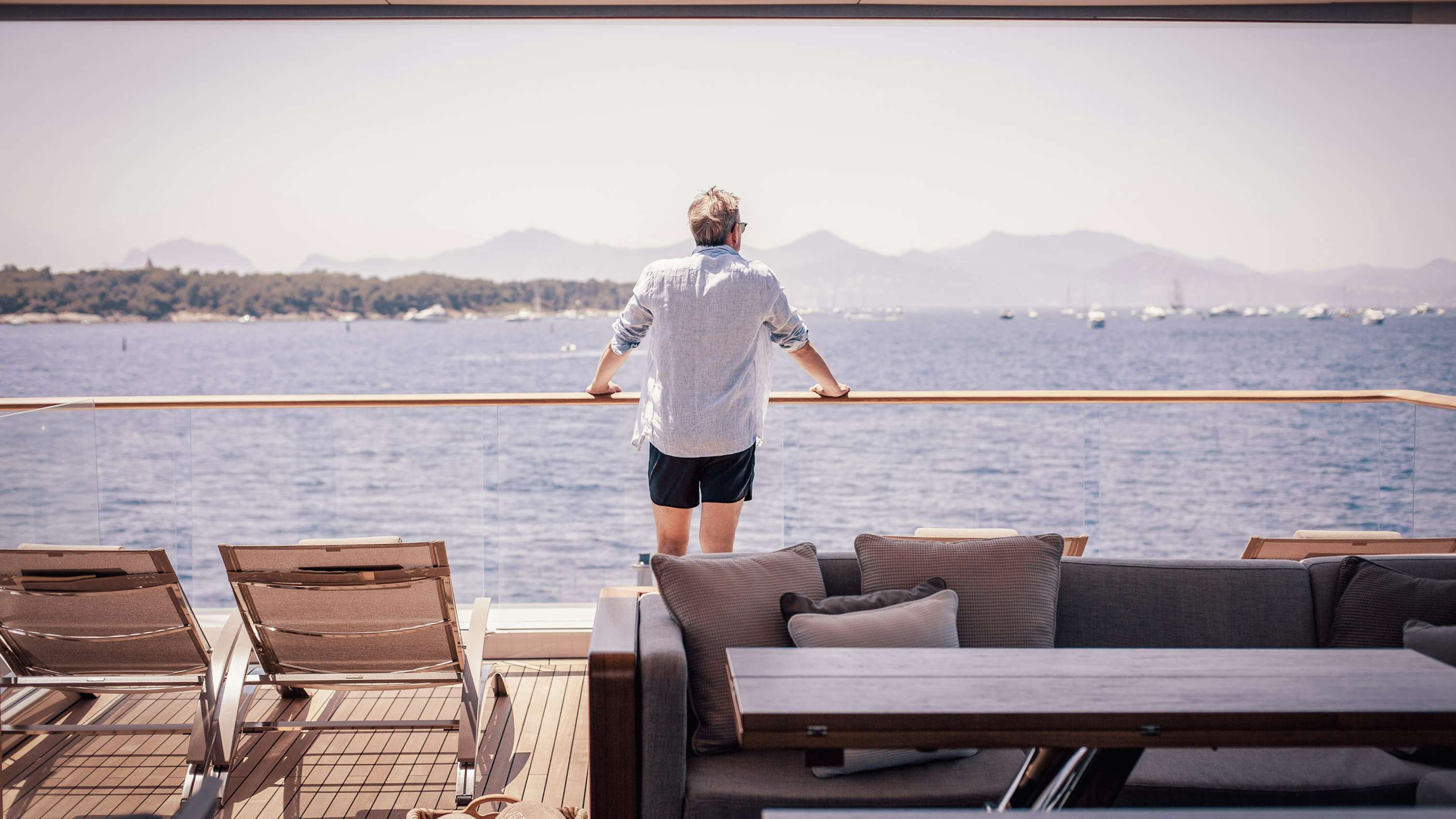 Yacht owner looking at panorama from onboard his yacht | Yacht Brokerage | N&J