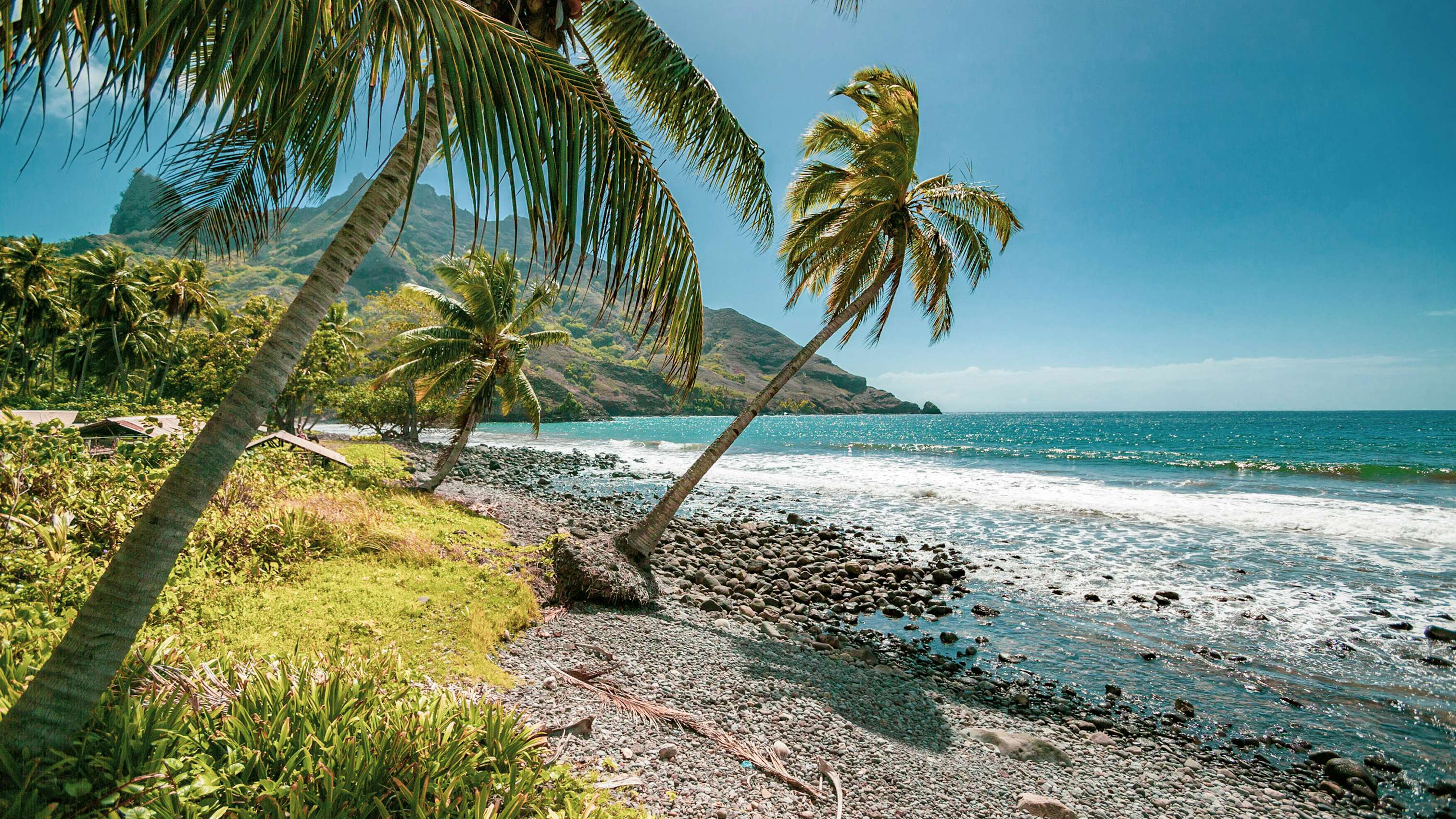 Marquesas Yacht Charter Landscape with Beach and mountains on Hiva Oa Island, Marquesas Islands, French Polynesia