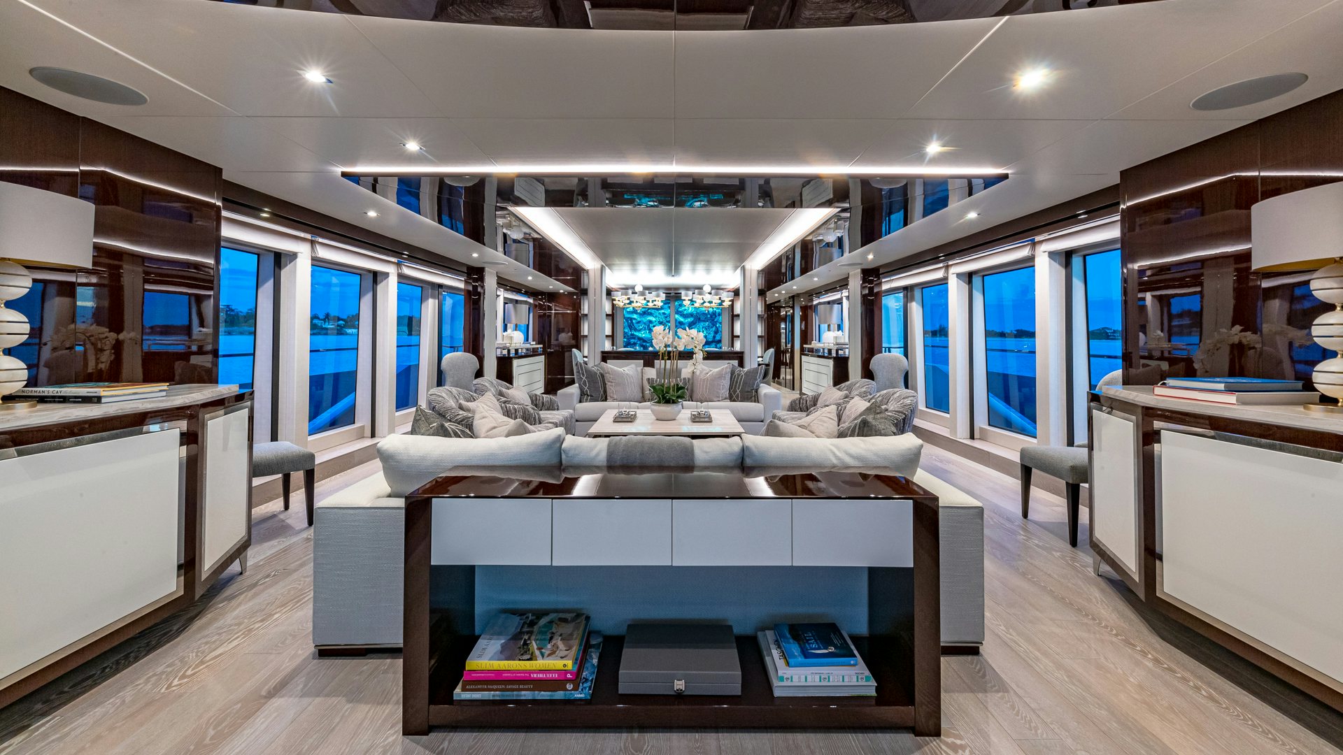 The luxurious and spacious interior salon of the Sunseeker 40 yacht, with elegant seating, panoramic windows, and contemporary design elements.