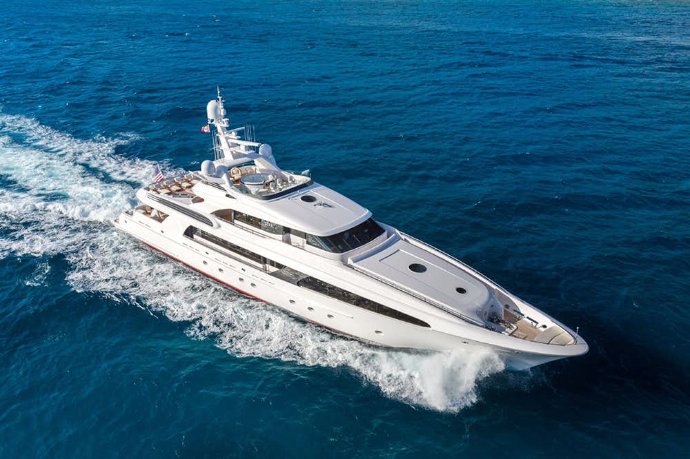 Side profile of superyacht USHER on the water