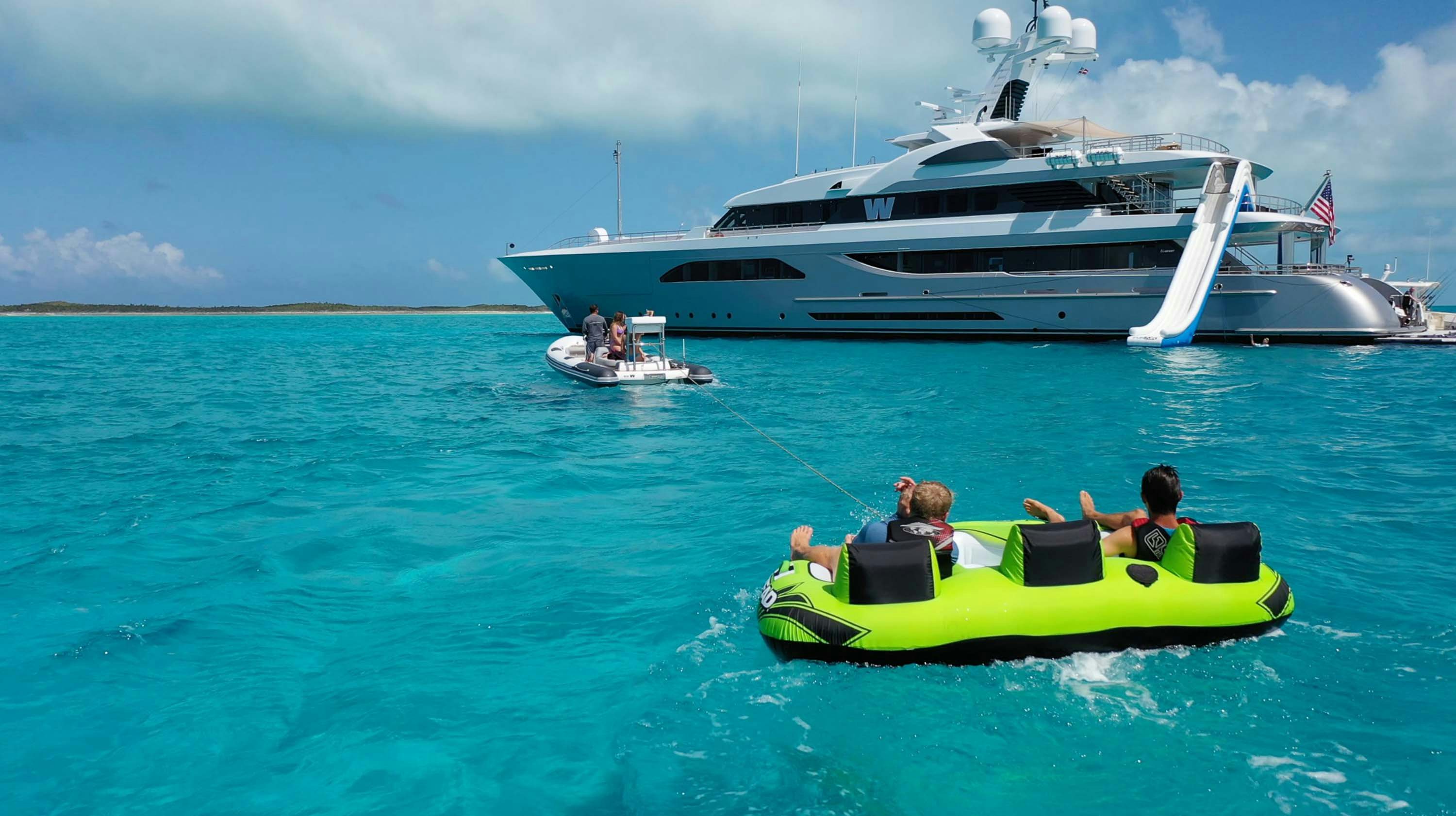 guests onboard W on towable tube