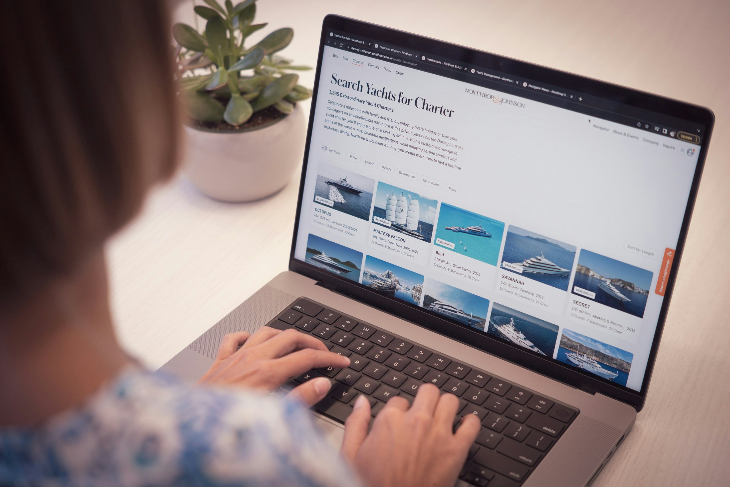 Web Presence Woman displaying website on computer screen