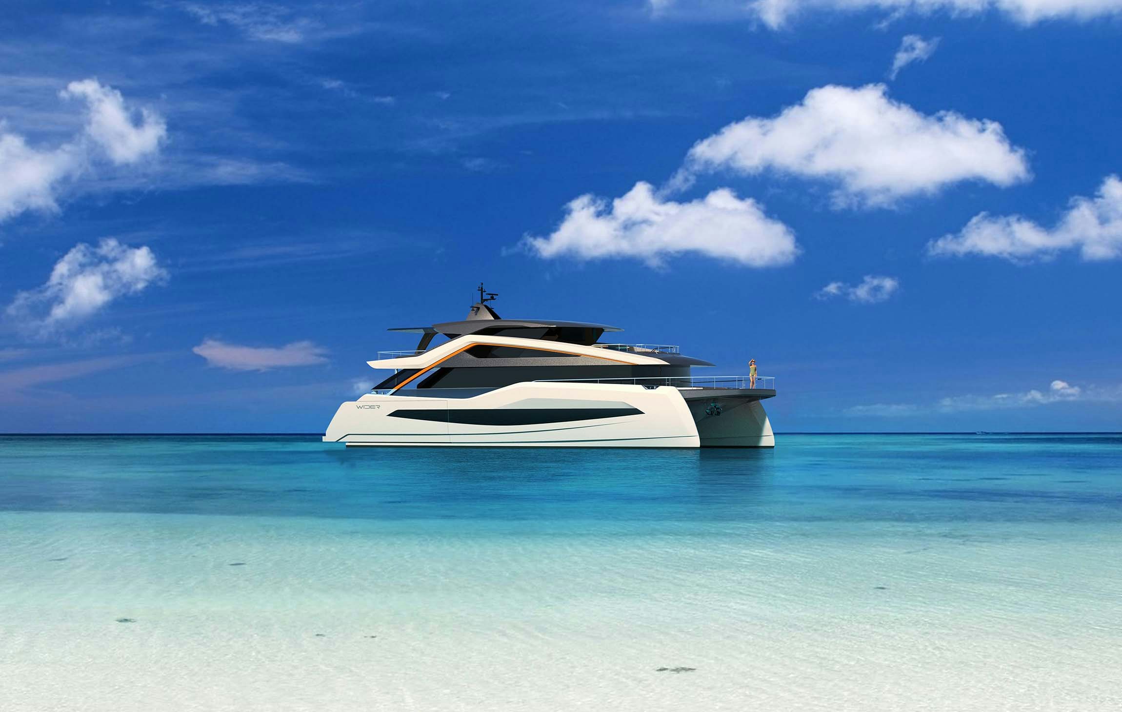 Wider Yachts white and black catamaran anchored in the ocean somewhere tropical