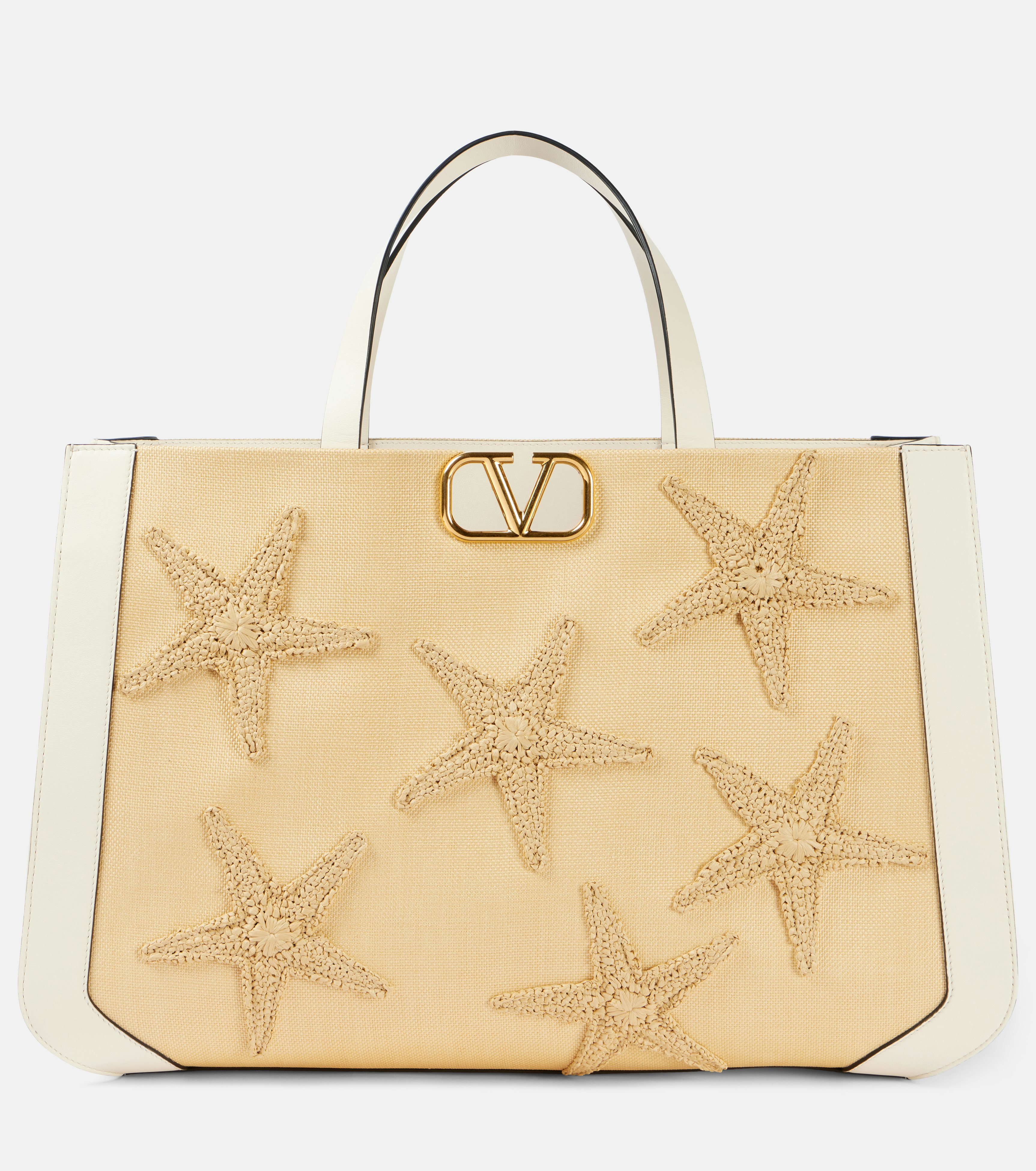 Womens gold Valentino bag with starfish