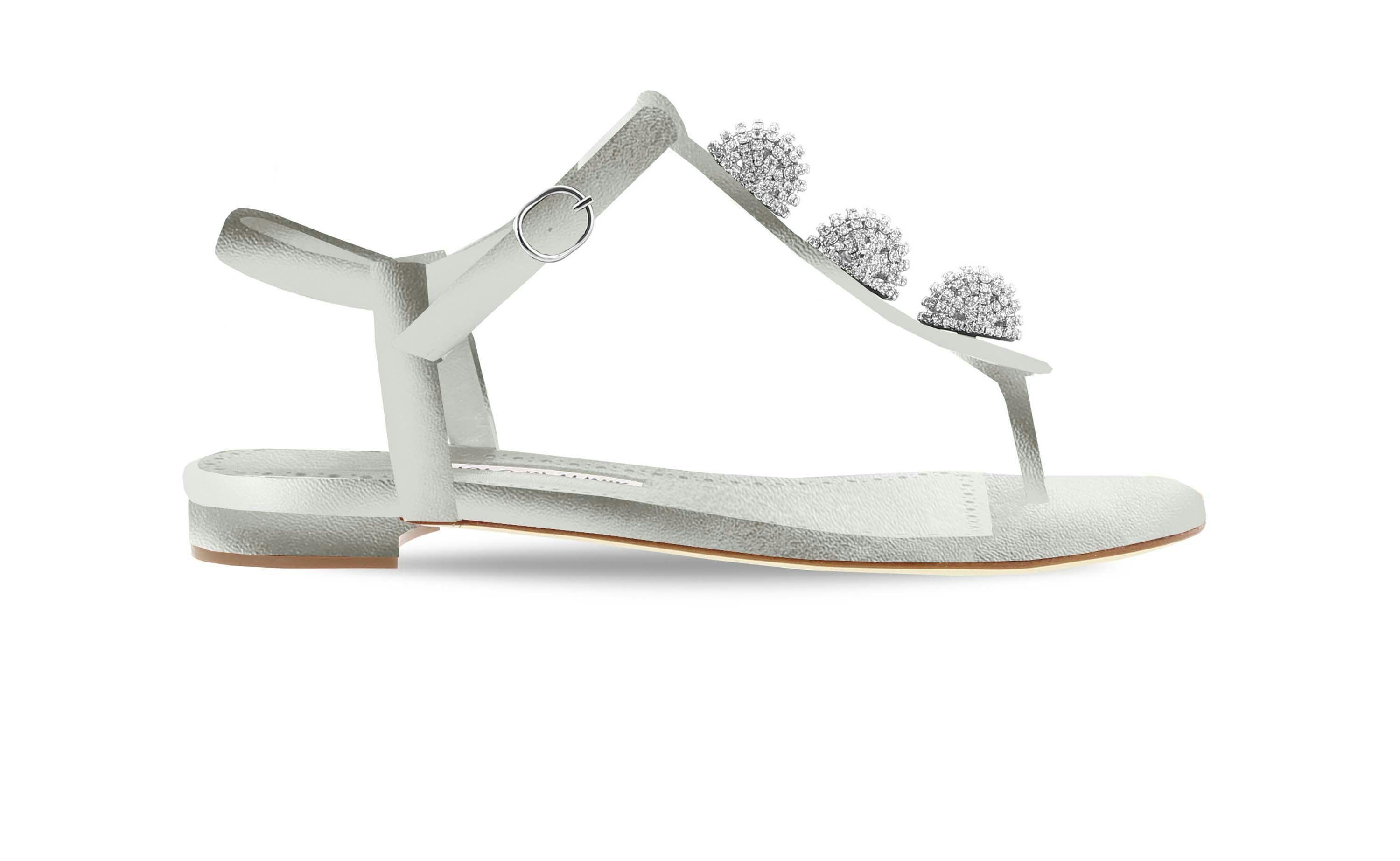Women&#039;s silver sandal with embellishment details