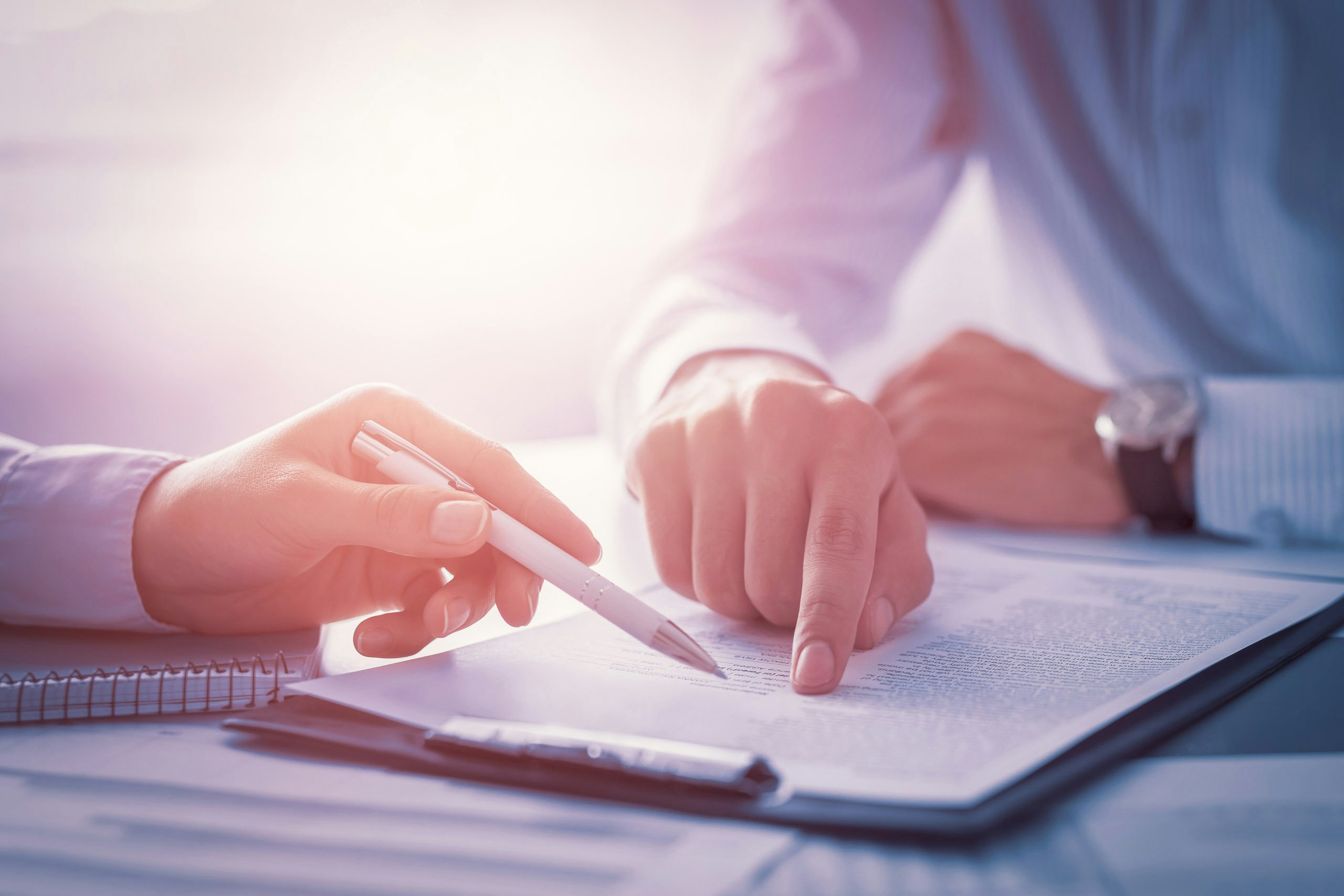 Business people going over contract