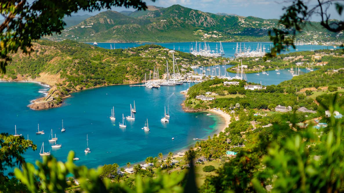 Top view of Antigua coast and port with many boats offshore | Antigua Sailing week