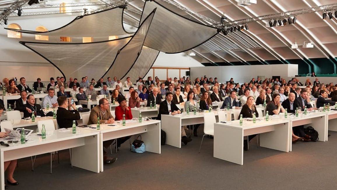 A captivated audience of professionals attending a conference session during the Superyacht Design Festival.